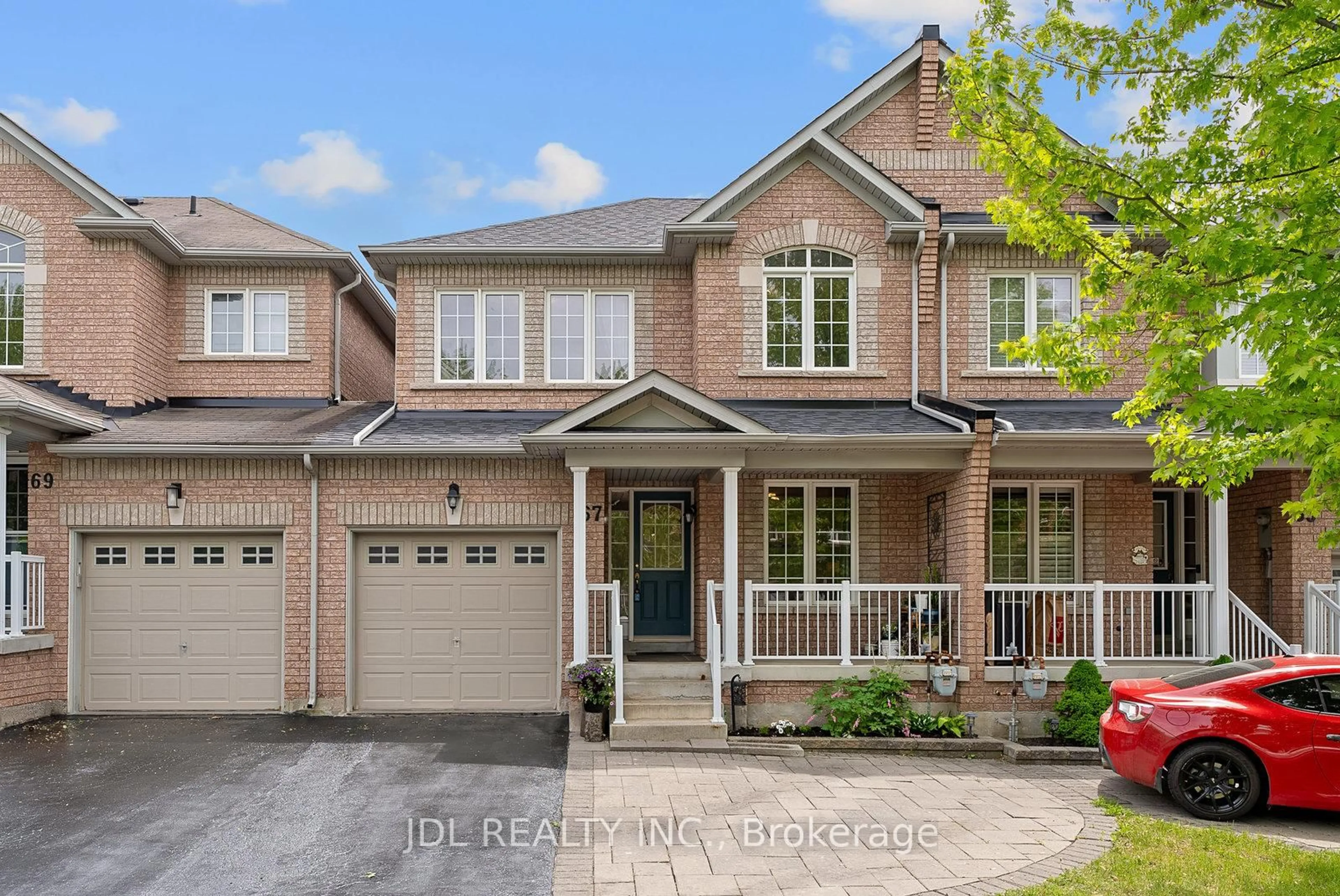 Home with brick exterior material, street for 67 Hawksbury Rd, Markham Ontario L6E 0E8