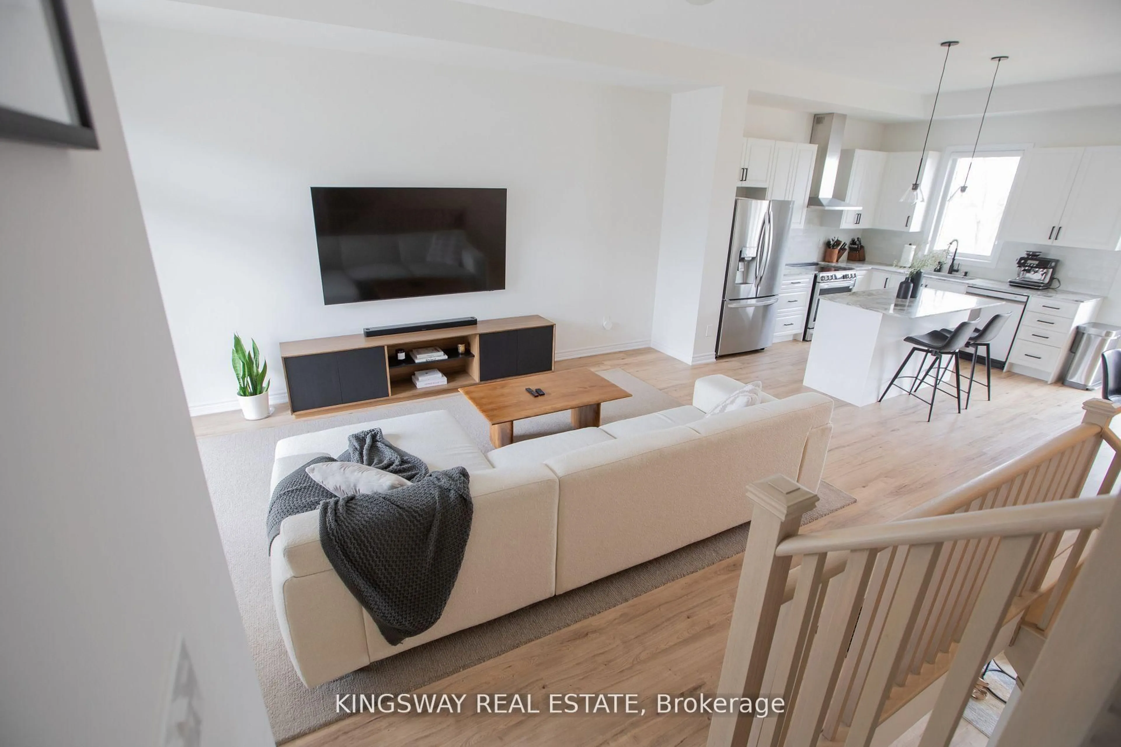 Living room with furniture, wood/laminate floor for 27 Paradox St, Vaughan Ontario L4L 1A7