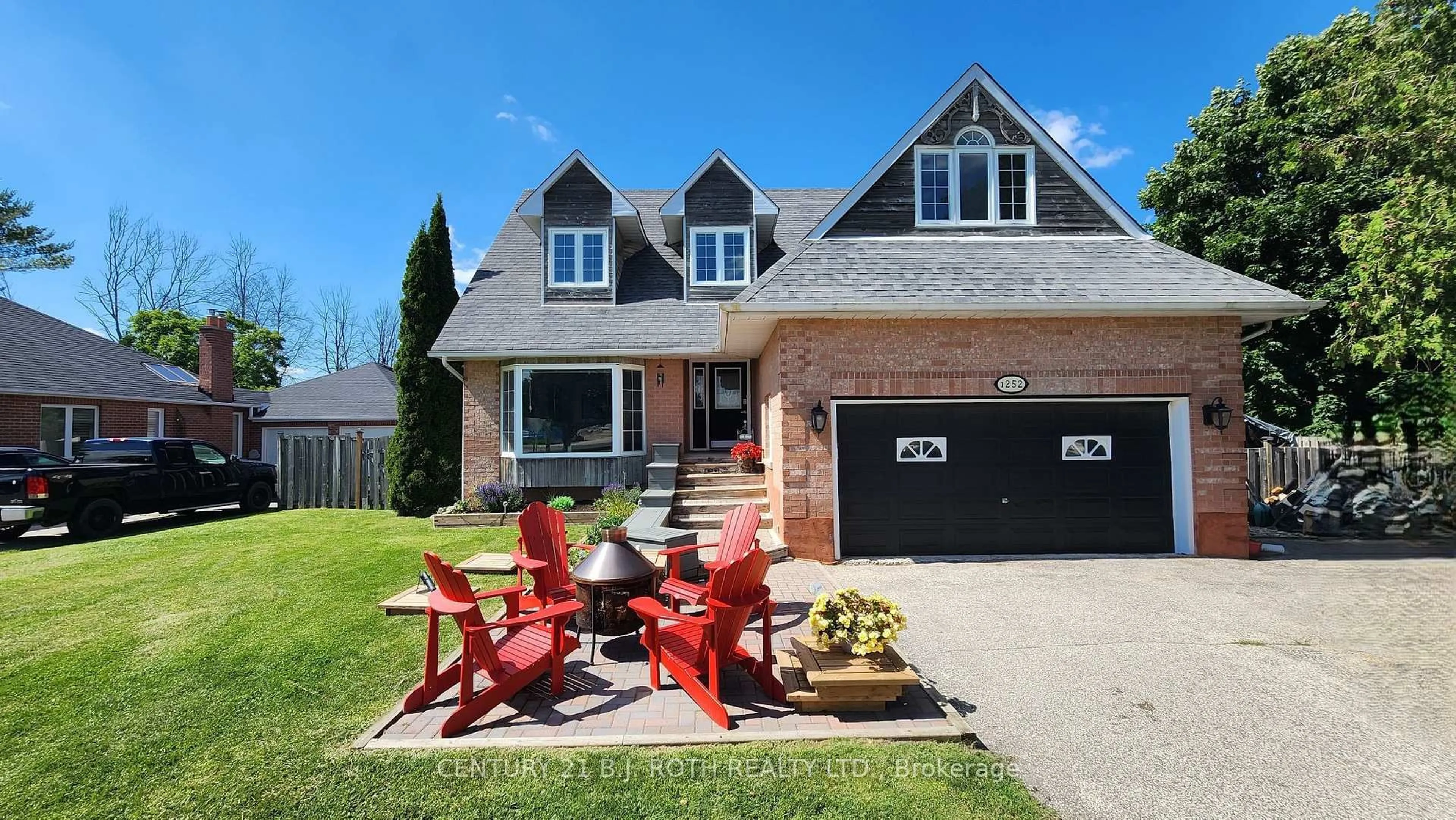 Home with brick exterior material, street for 1252 Shore Acres Dr, Innisfil Ontario L0L 1R0