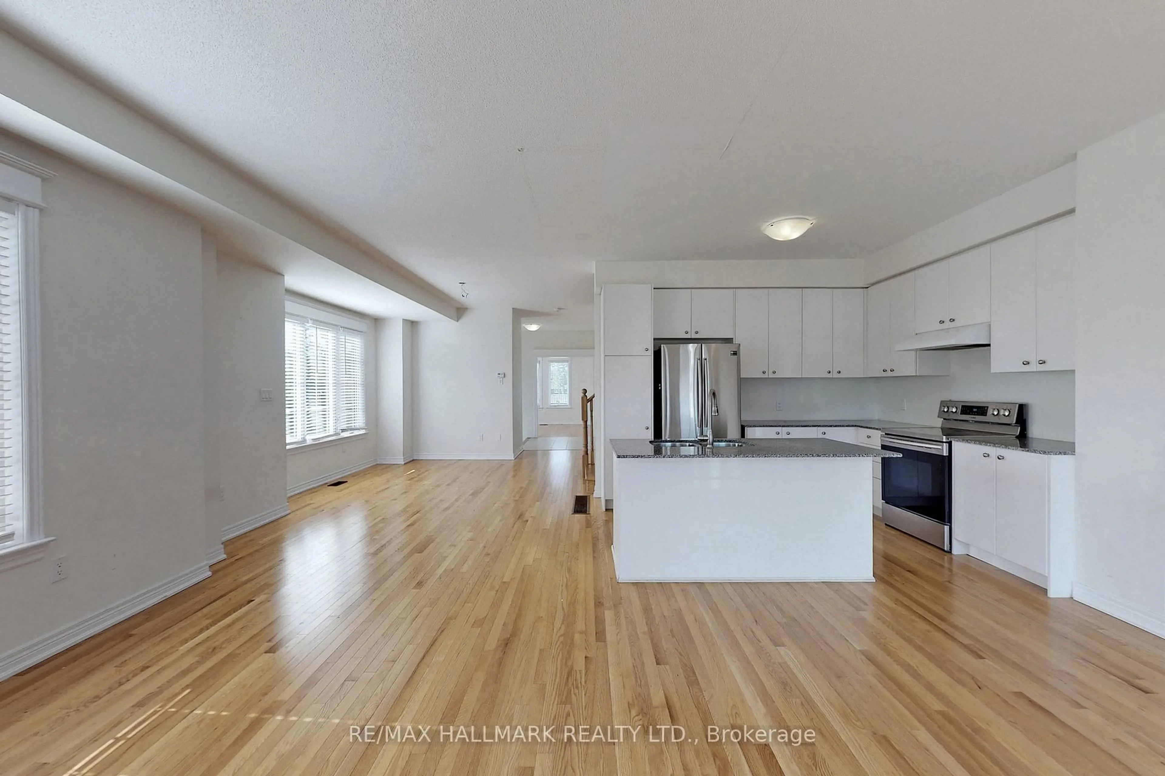 Open concept kitchen, wood/laminate floor for 1 Bellflower Lane, Richmond Hill Ontario L4E 1E7