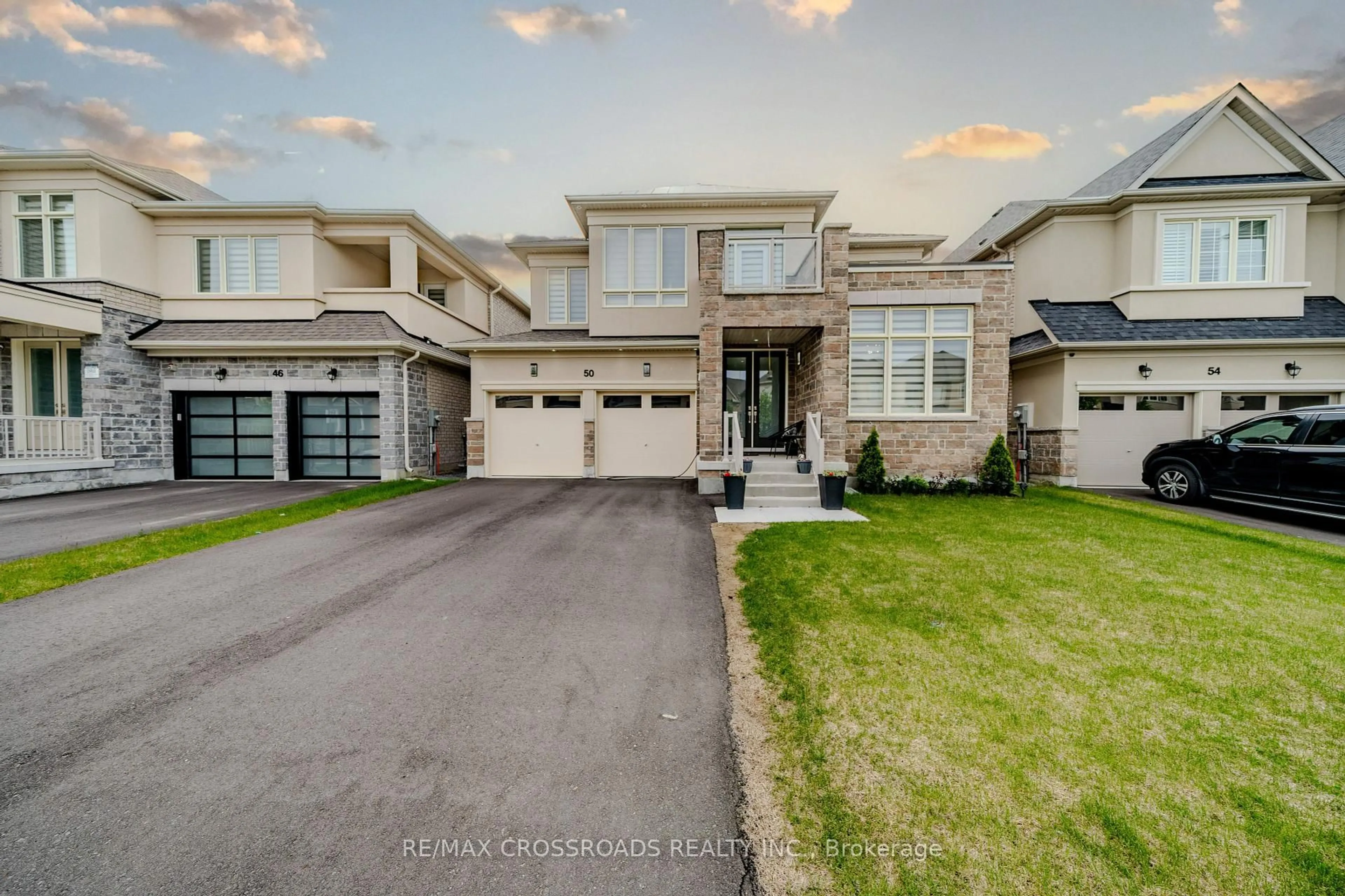 A pic from outside/outdoor area/front of a property/back of a property/a pic from drone, street for 50 Carriage Shop Bend, East Gwillimbury Ontario L9N 0Y5