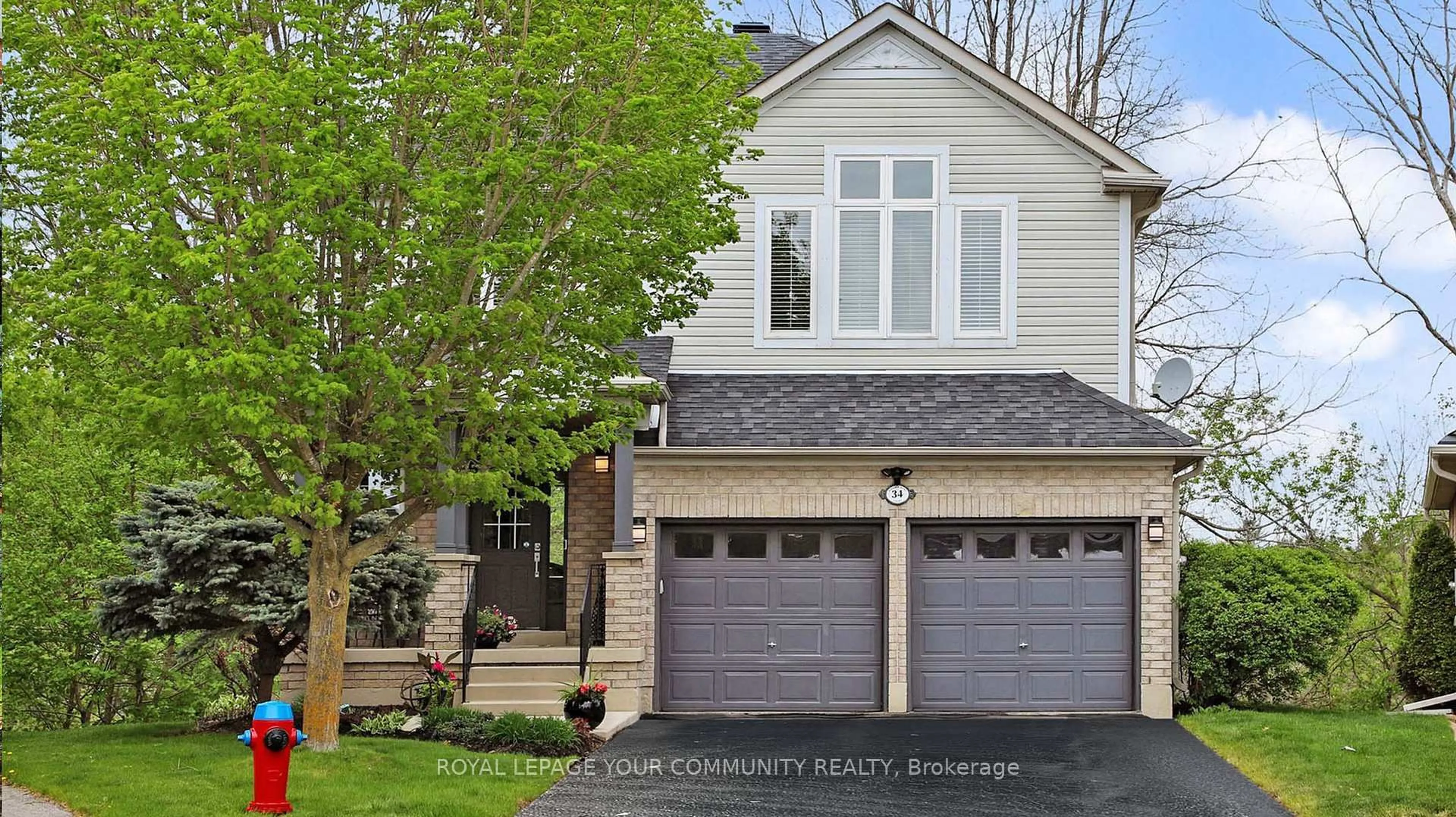 Home with brick exterior material, street for 34 Willard Hunt Crt, King Ontario L0G 1T0