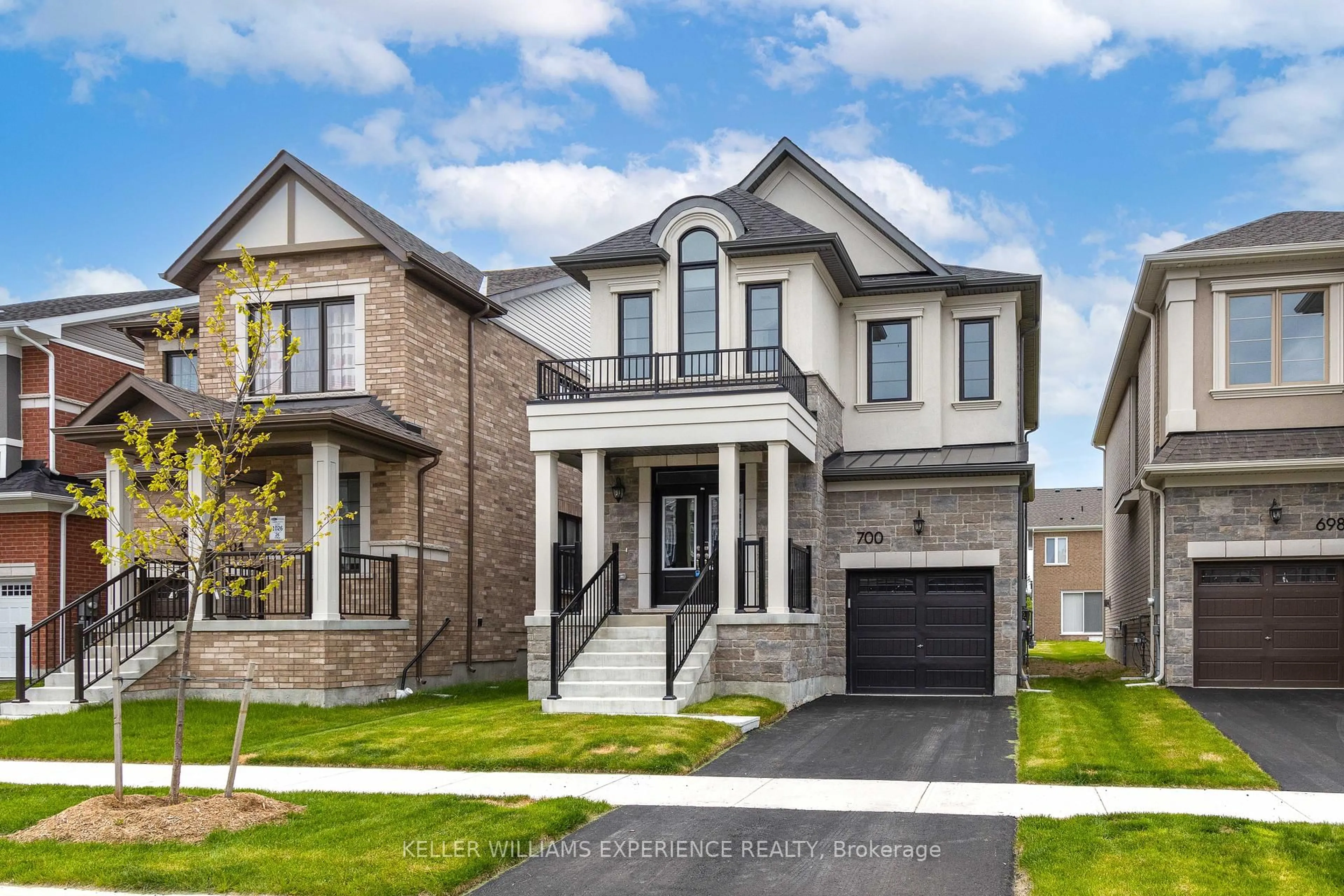 Home with brick exterior material, street for 700 Mika St, Innisfil Ontario L9S 0R7