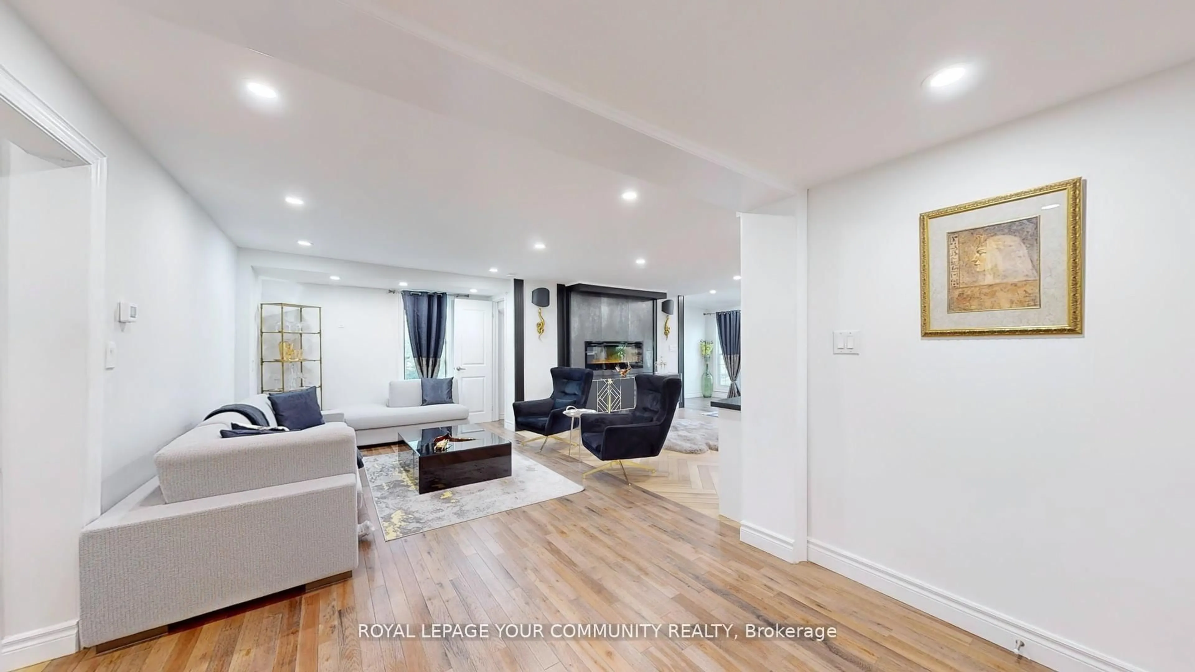 Living room with furniture, wood/laminate floor for 64 Machell Ave, Aurora Ontario L4G 2R7