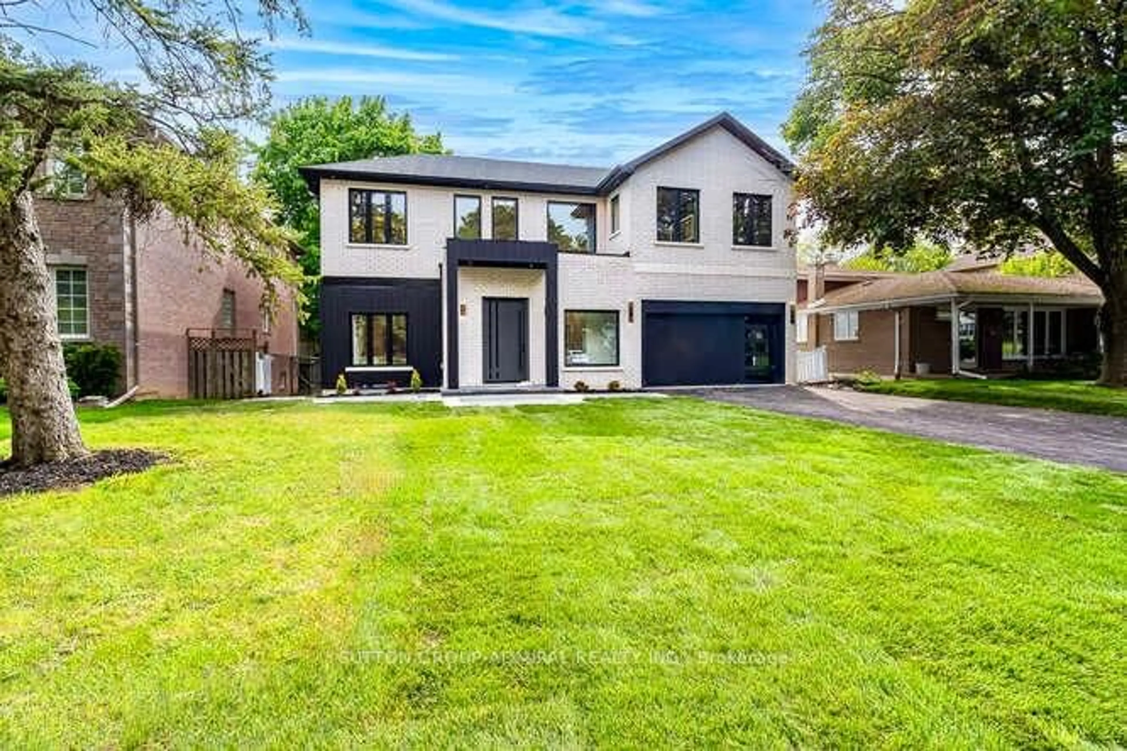 Home with brick exterior material, street for 98 babcombe Dr, Markham Ontario L3T 1N1