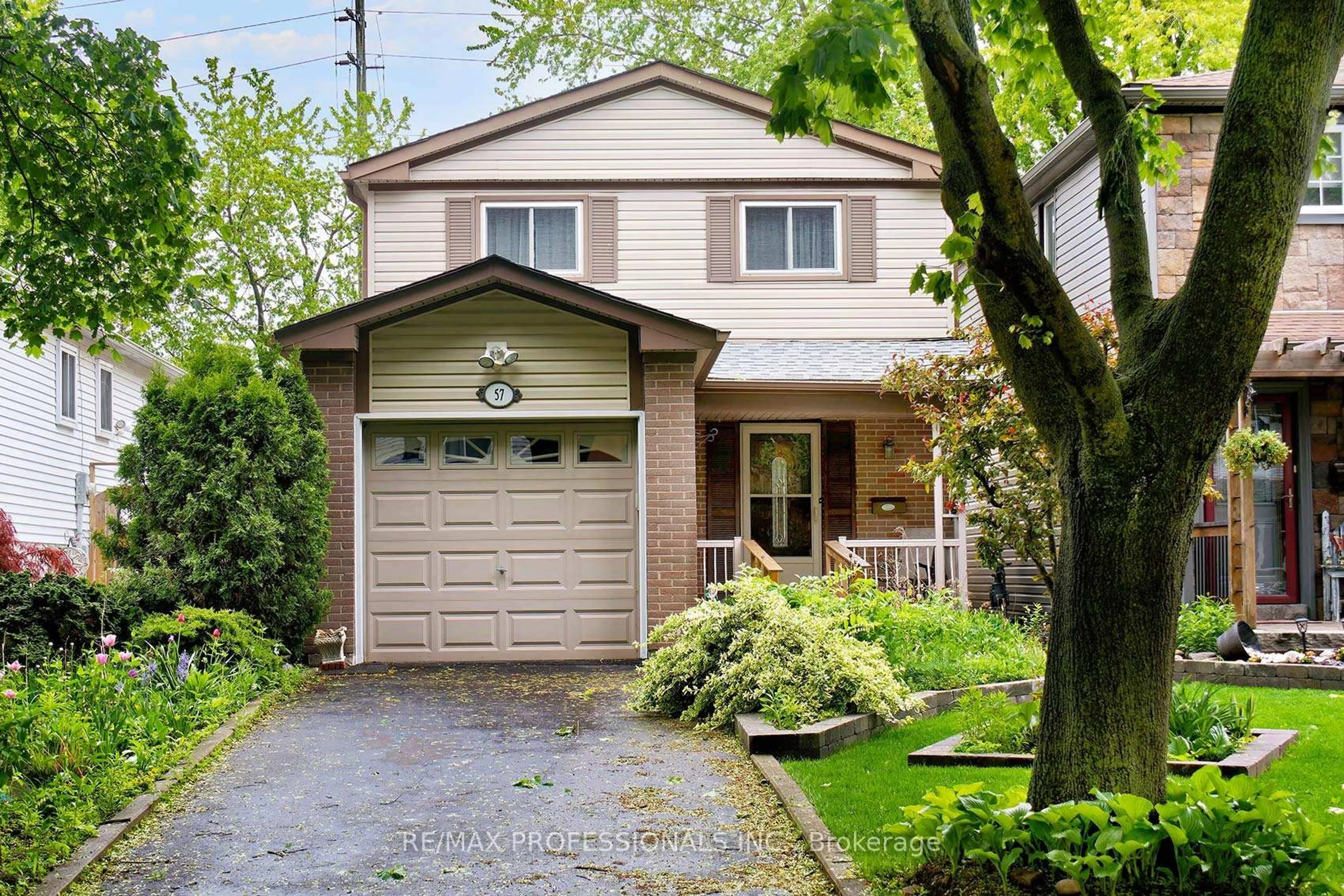 Home with brick exterior material, street for 57 Donnamora Cres, Markham Ontario L3T 4K6