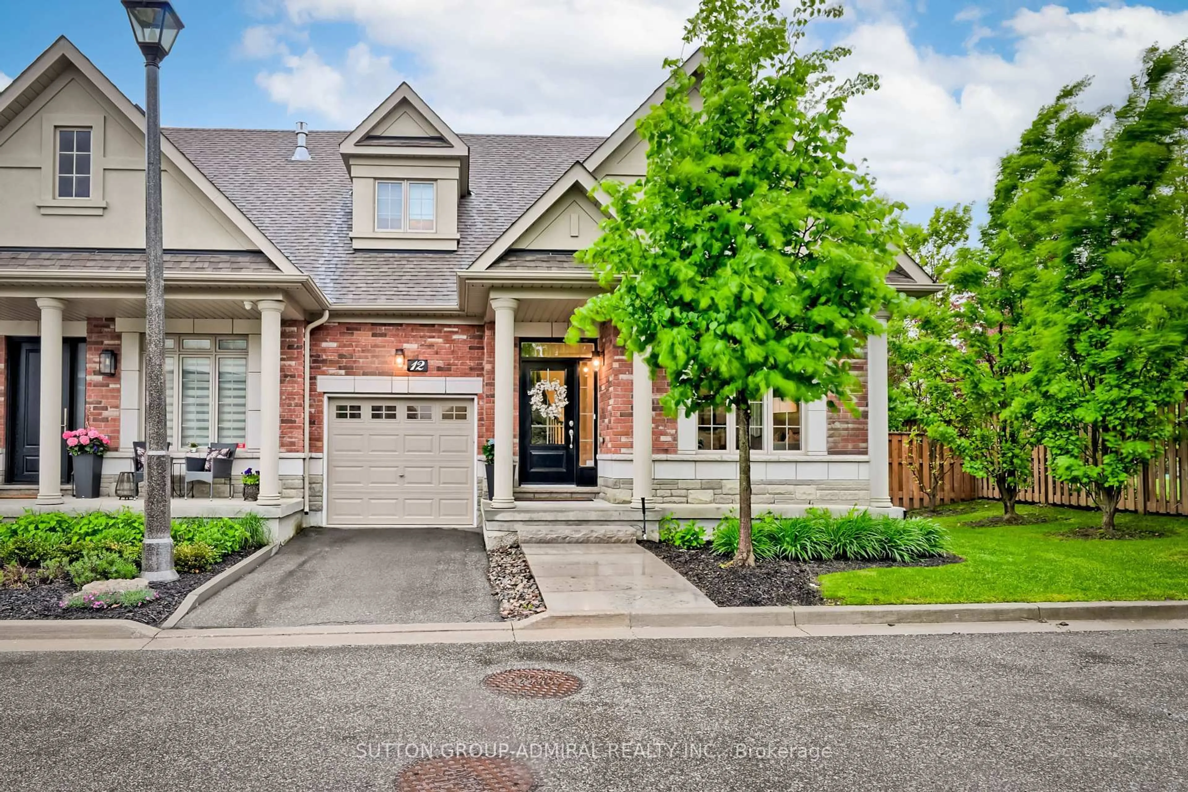 Home with brick exterior material, street for 12 Petersen Pl, King Ontario L9G 1N0