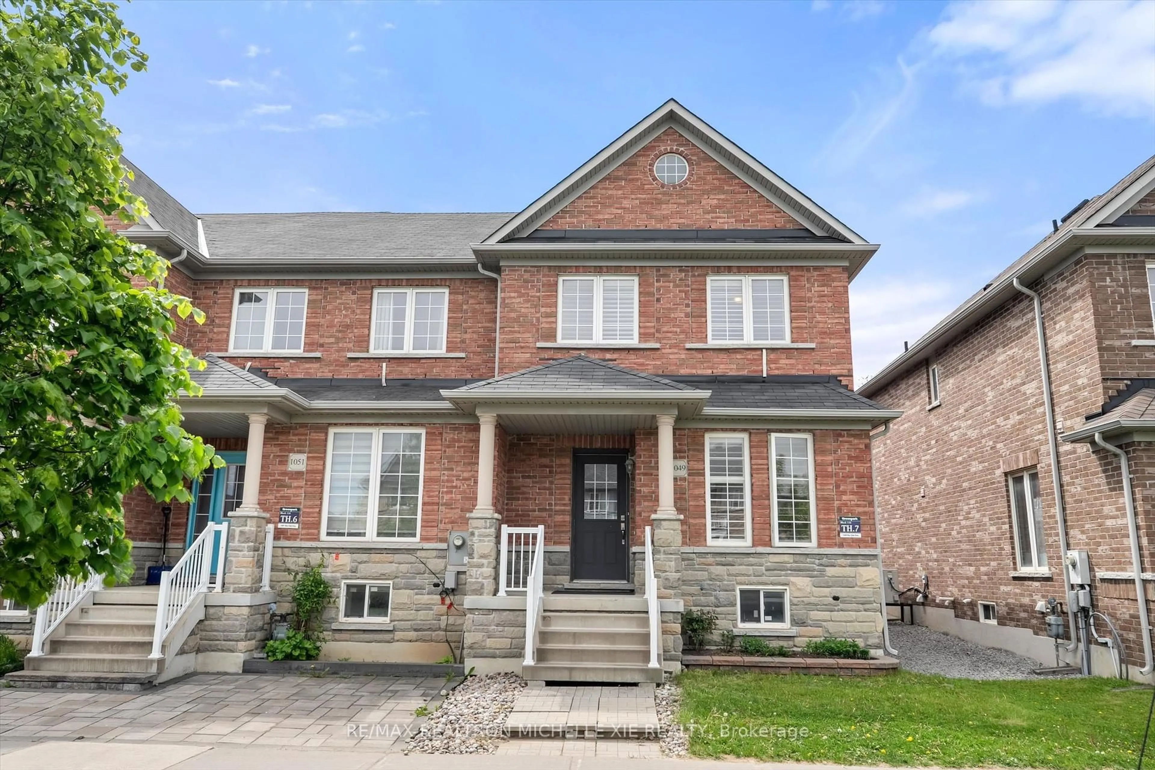 Home with brick exterior material, street for 1049 Bur Oak Ave, Markham Ontario L6E 1H6