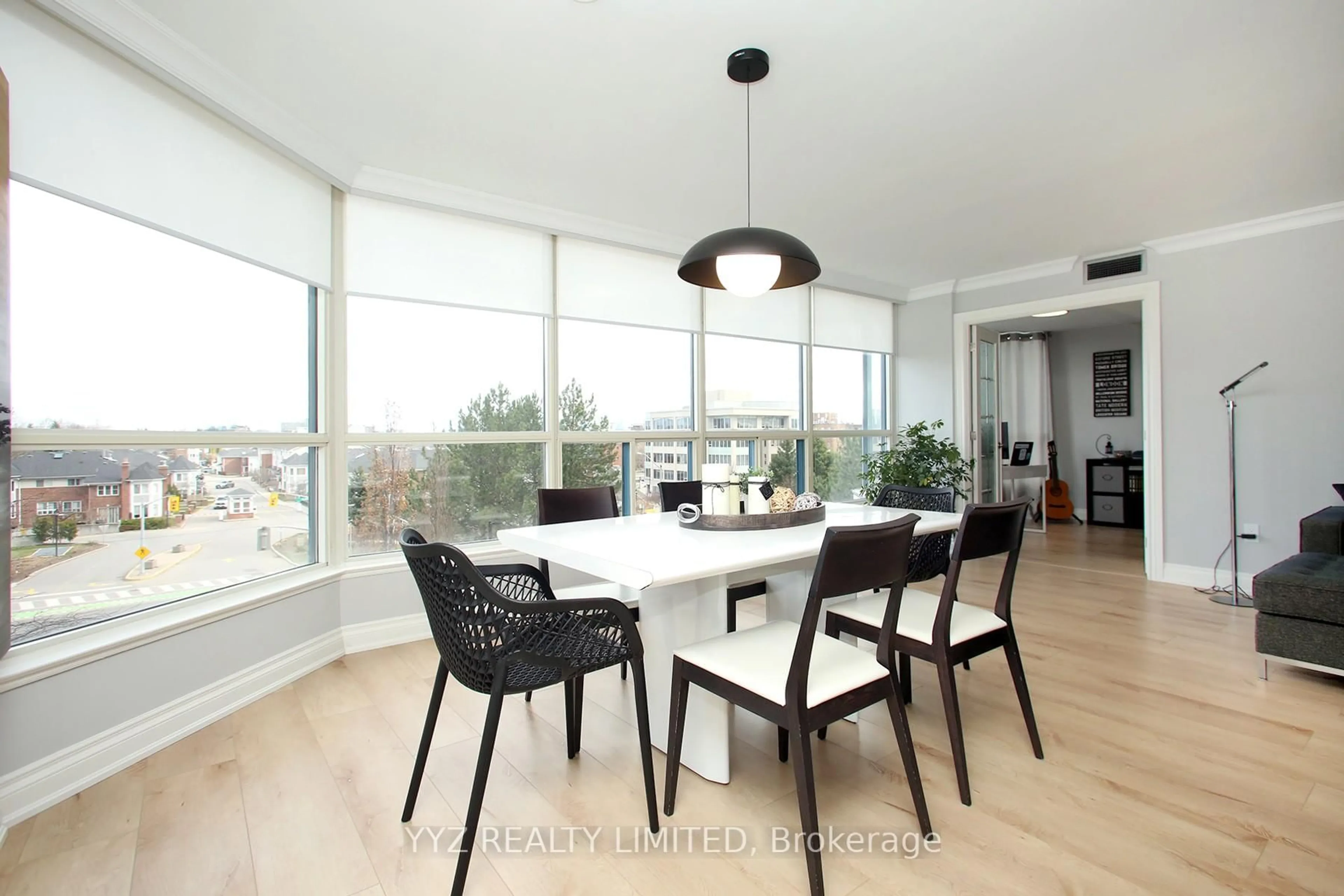 Dining room, wood/laminate floor for 1 Clark Ave #407, Vaughan Ontario L4J 7Y6