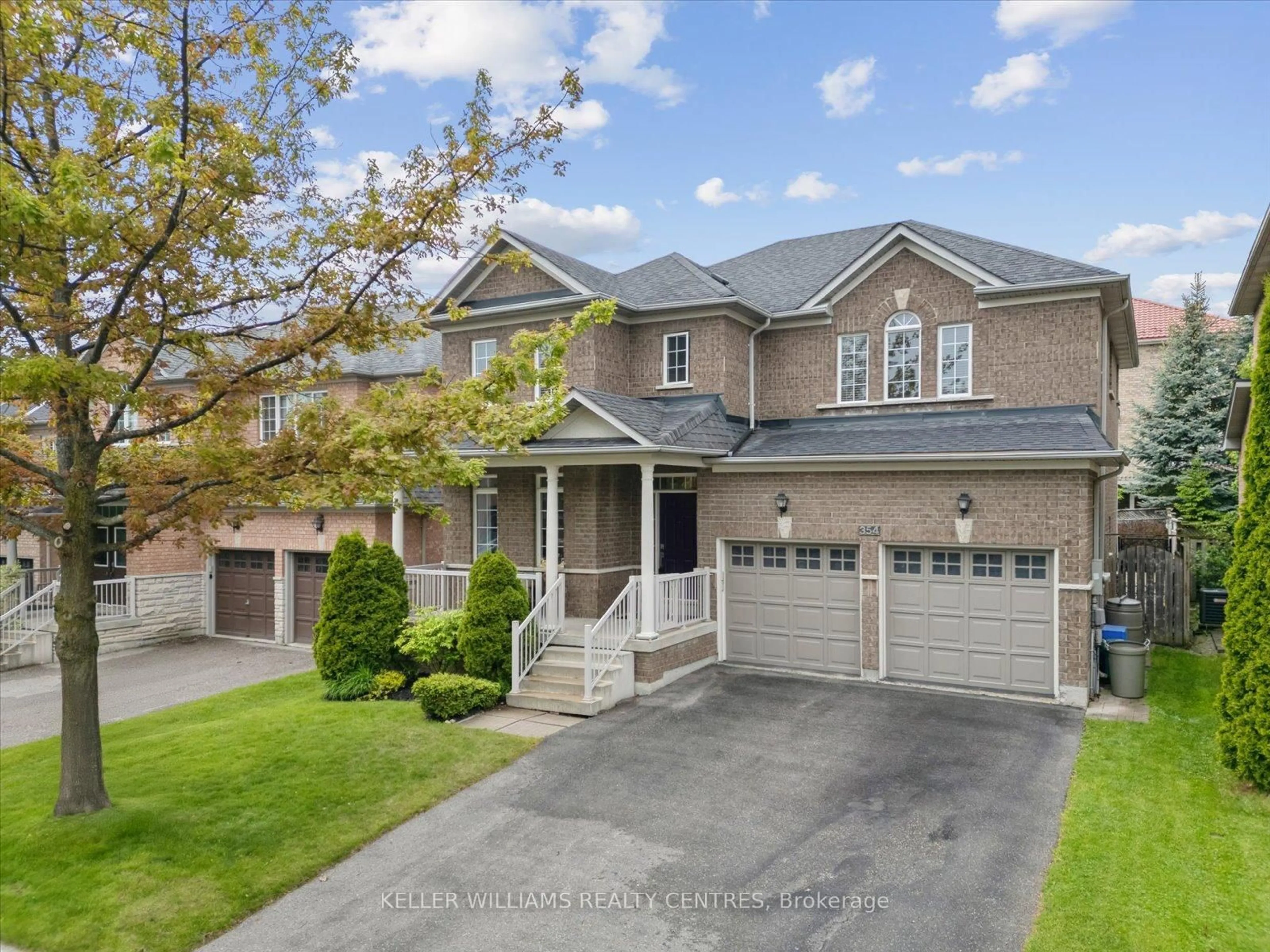 Home with brick exterior material, street for 354 Coachwhip Tr, Newmarket Ontario L3X 2R6