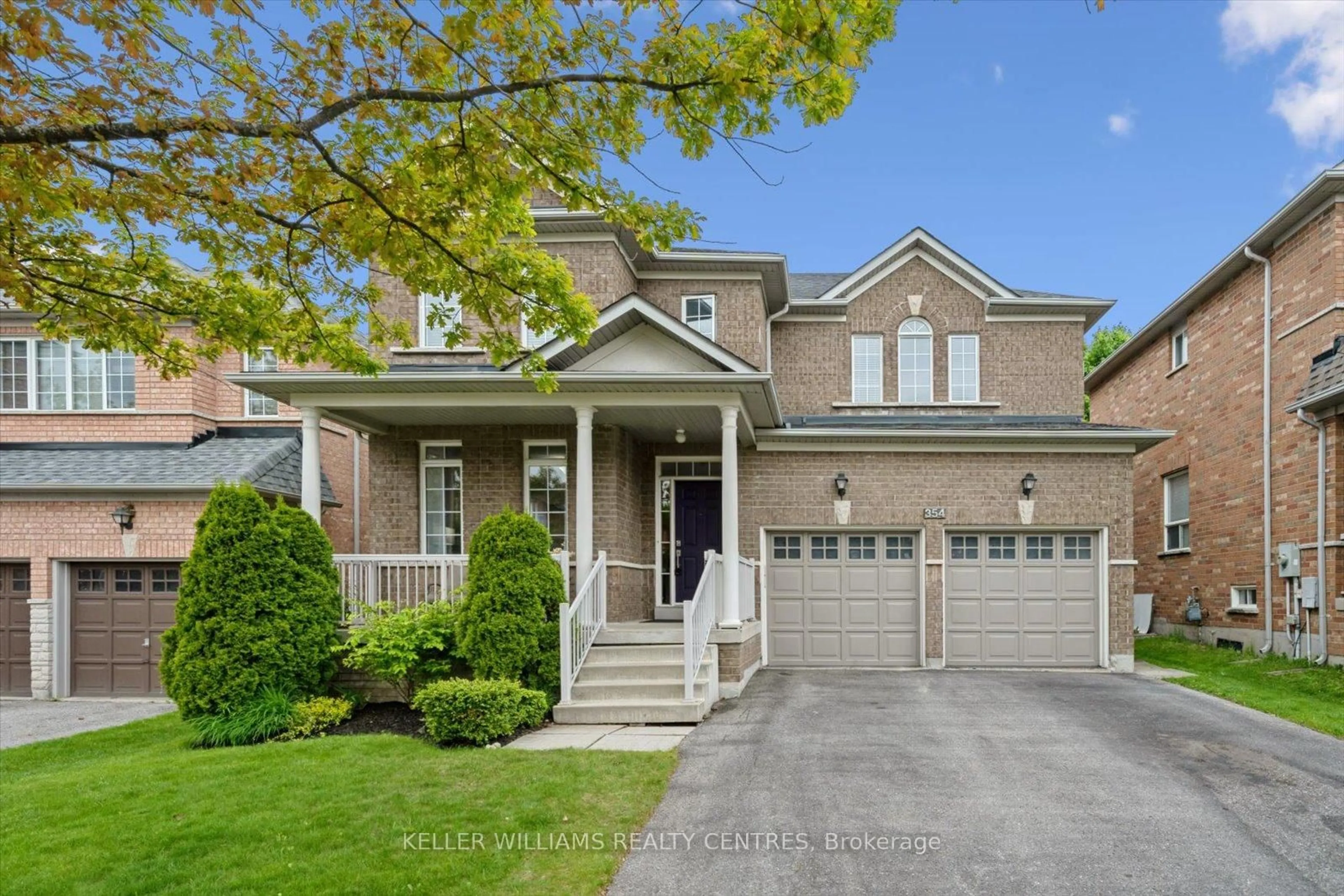 Home with brick exterior material, street for 354 Coachwhip Tr, Newmarket Ontario L3X 2R6