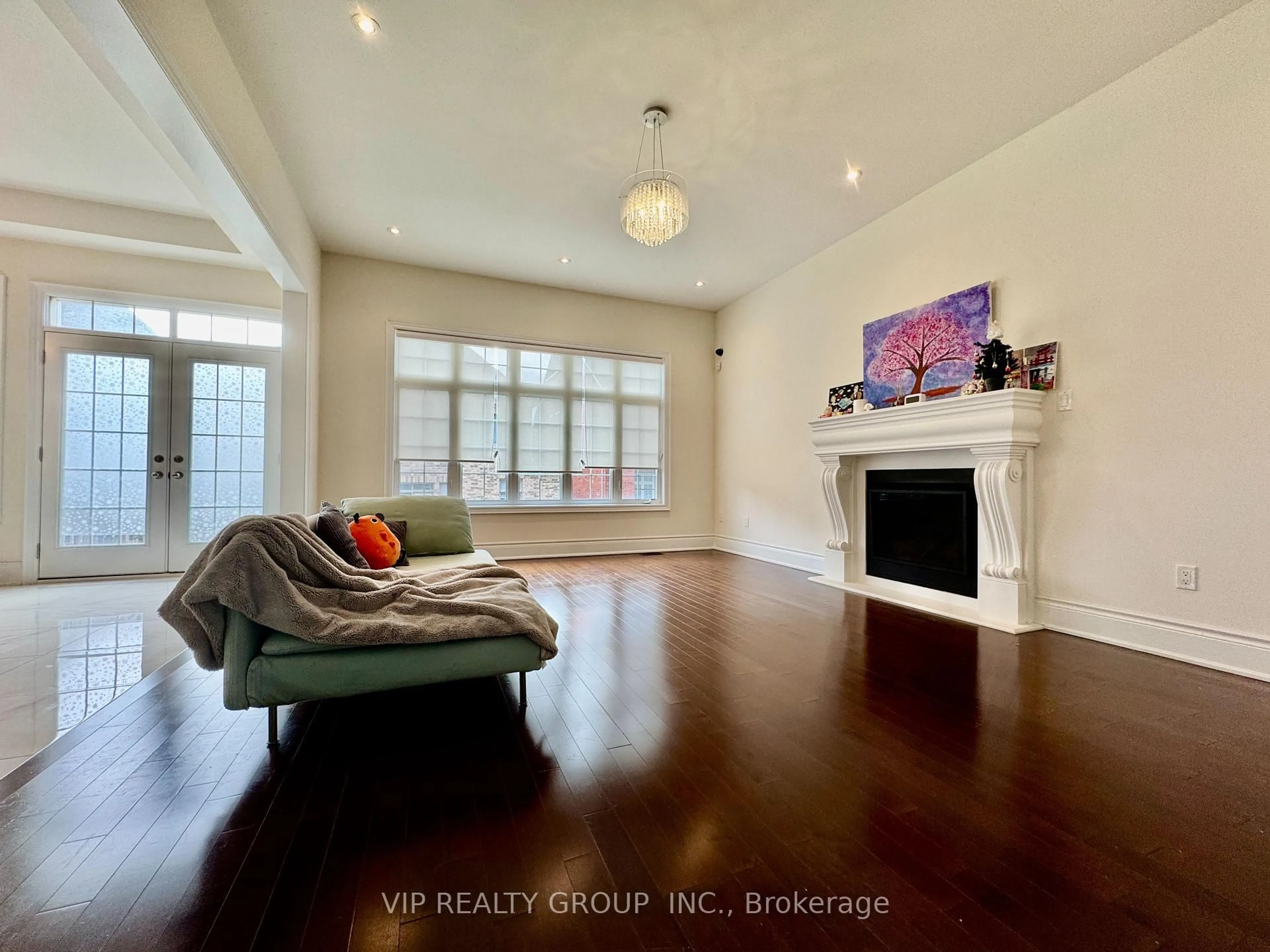 Living room with furniture, wood/laminate floor for 55 Yates Ave, Vaughan Ontario L6A 0J1