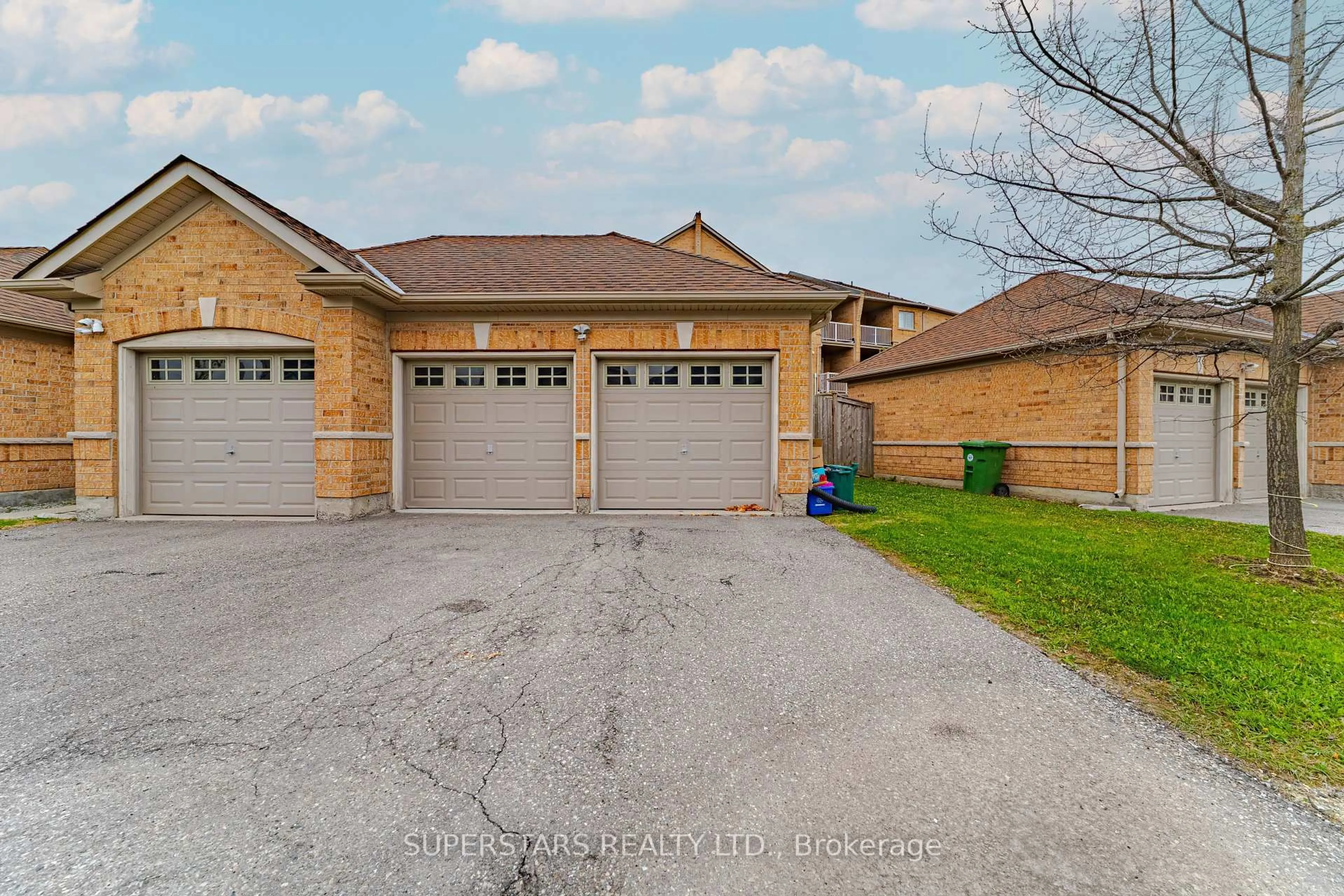Home with brick exterior material, street for 30 Greensborough Village Circ #22, Markham Ontario L6E 1Z1