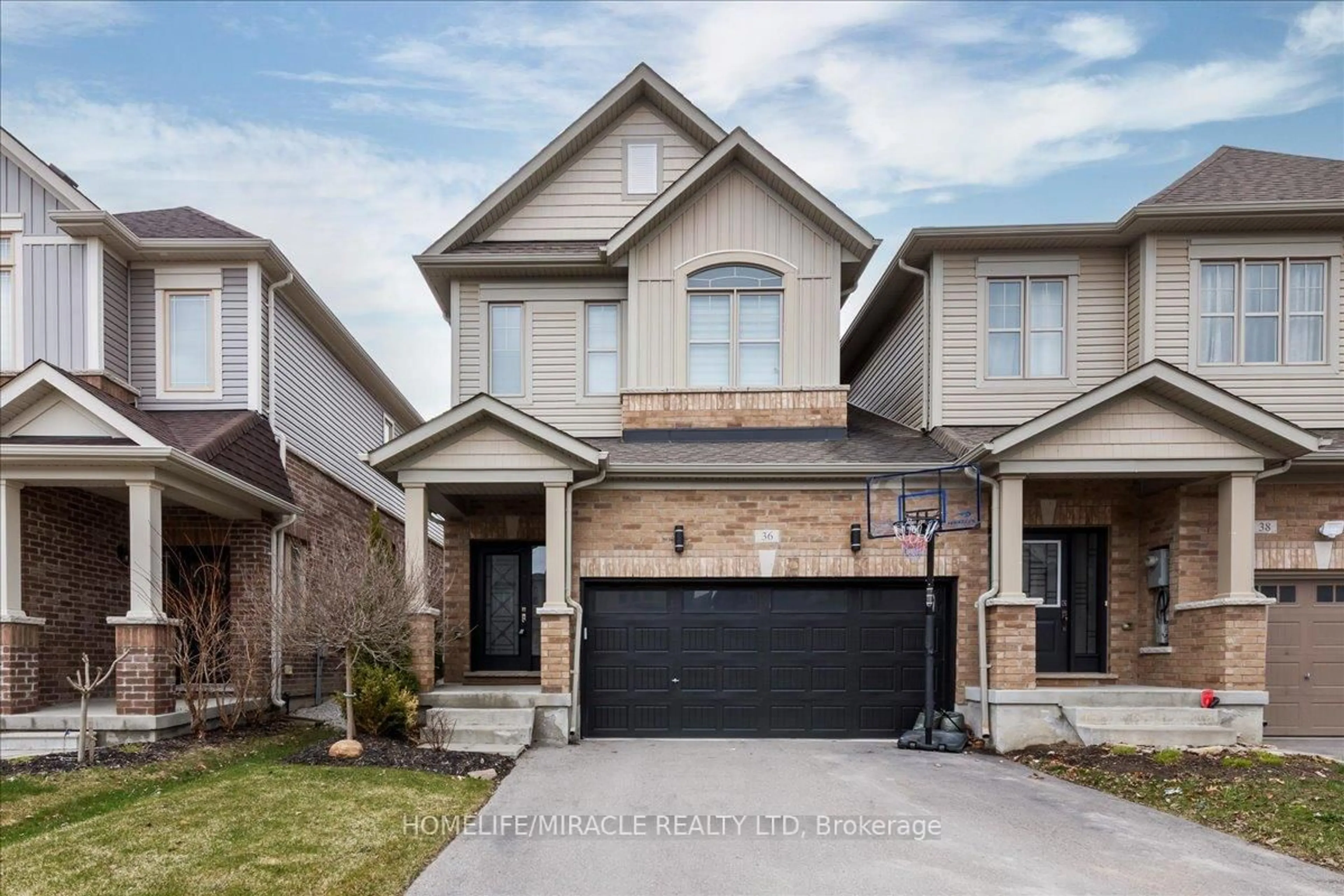 Home with brick exterior material, street for 36 Hoard Ave, New Tecumseth Ontario L9R 0M3
