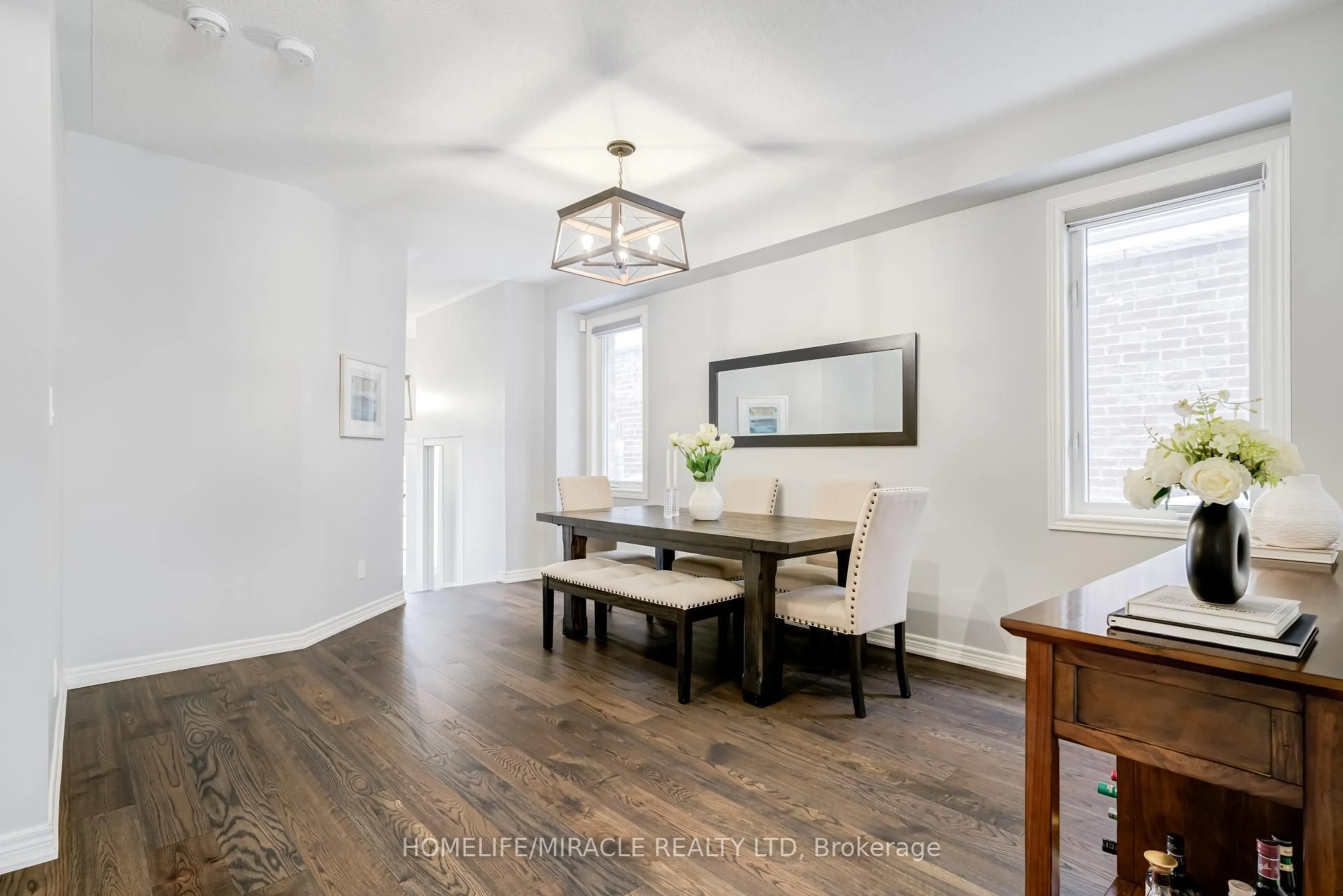 Dining room, wood/laminate floor for 36 Hoard Ave, New Tecumseth Ontario L9R 0M3