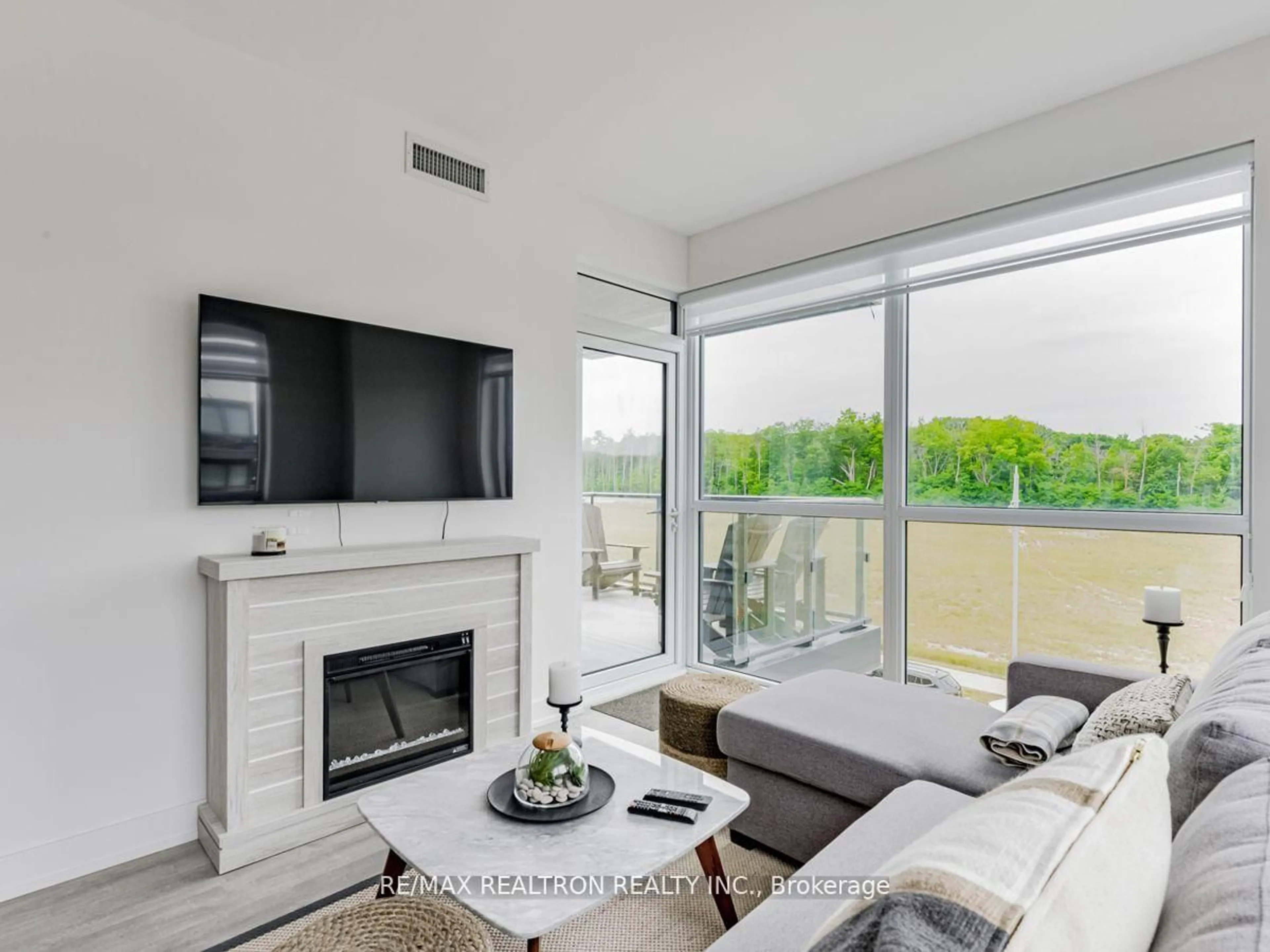 Living room with furniture, unknown for 375 Sea Ray Ave #310, Innisfil Ontario L9S 0N9