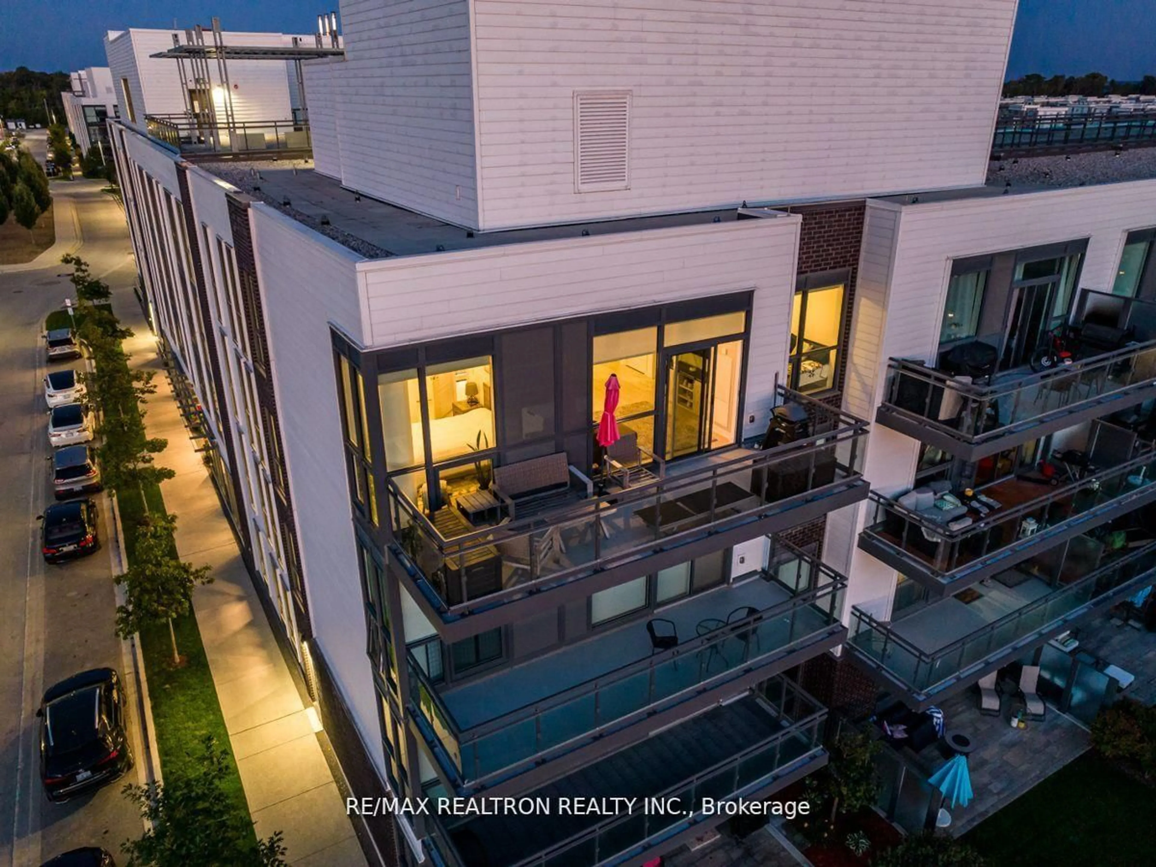 A pic from outside/outdoor area/front of a property/back of a property/a pic from drone, city buildings view from balcony for 333 Sea Ray Ave #D418, Innisfil Ontario L9S 0M3
