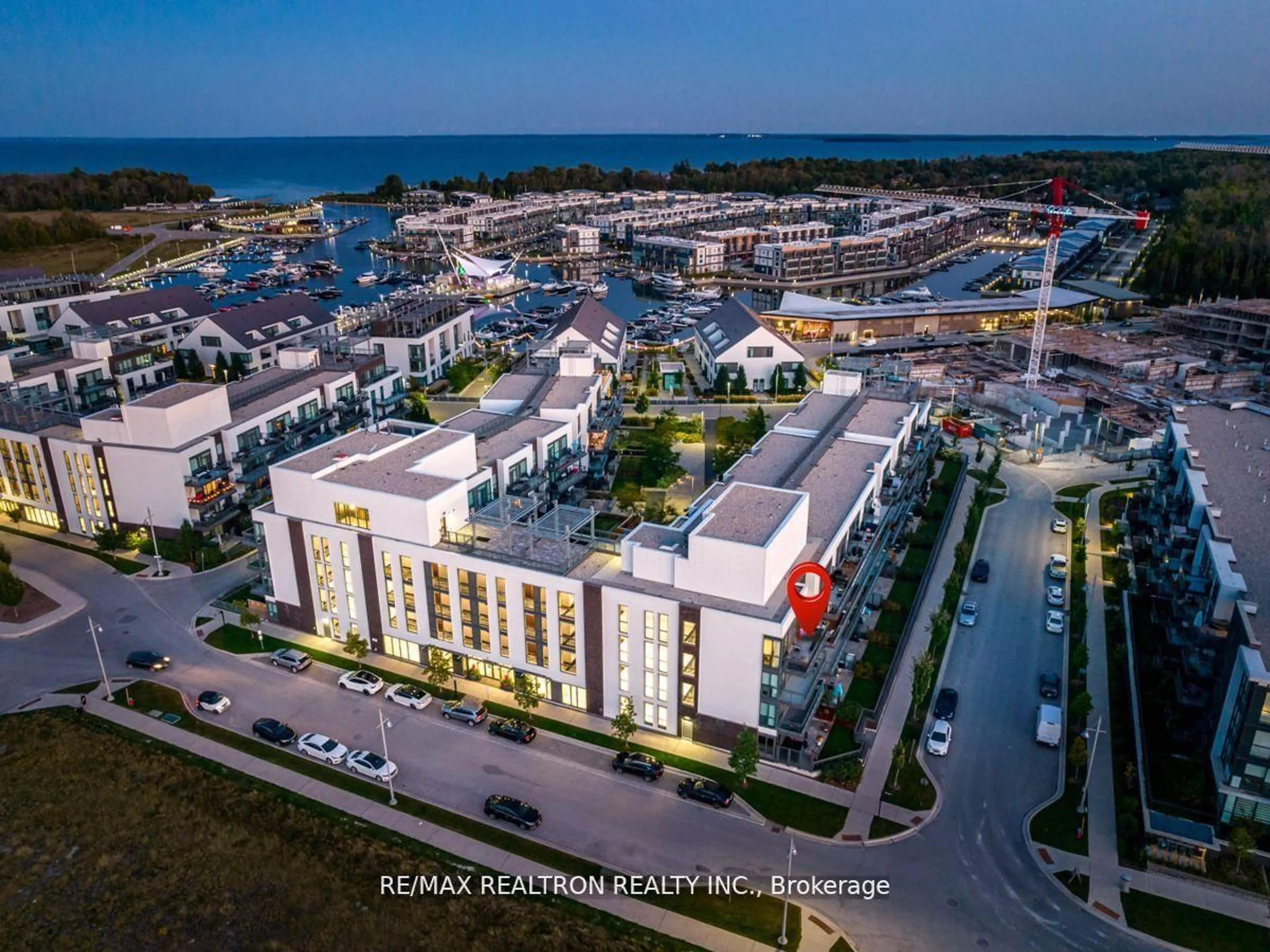 A pic from outside/outdoor area/front of a property/back of a property/a pic from drone, city buildings view from balcony for 333 Sea Ray Ave #D418, Innisfil Ontario L9S 0M3