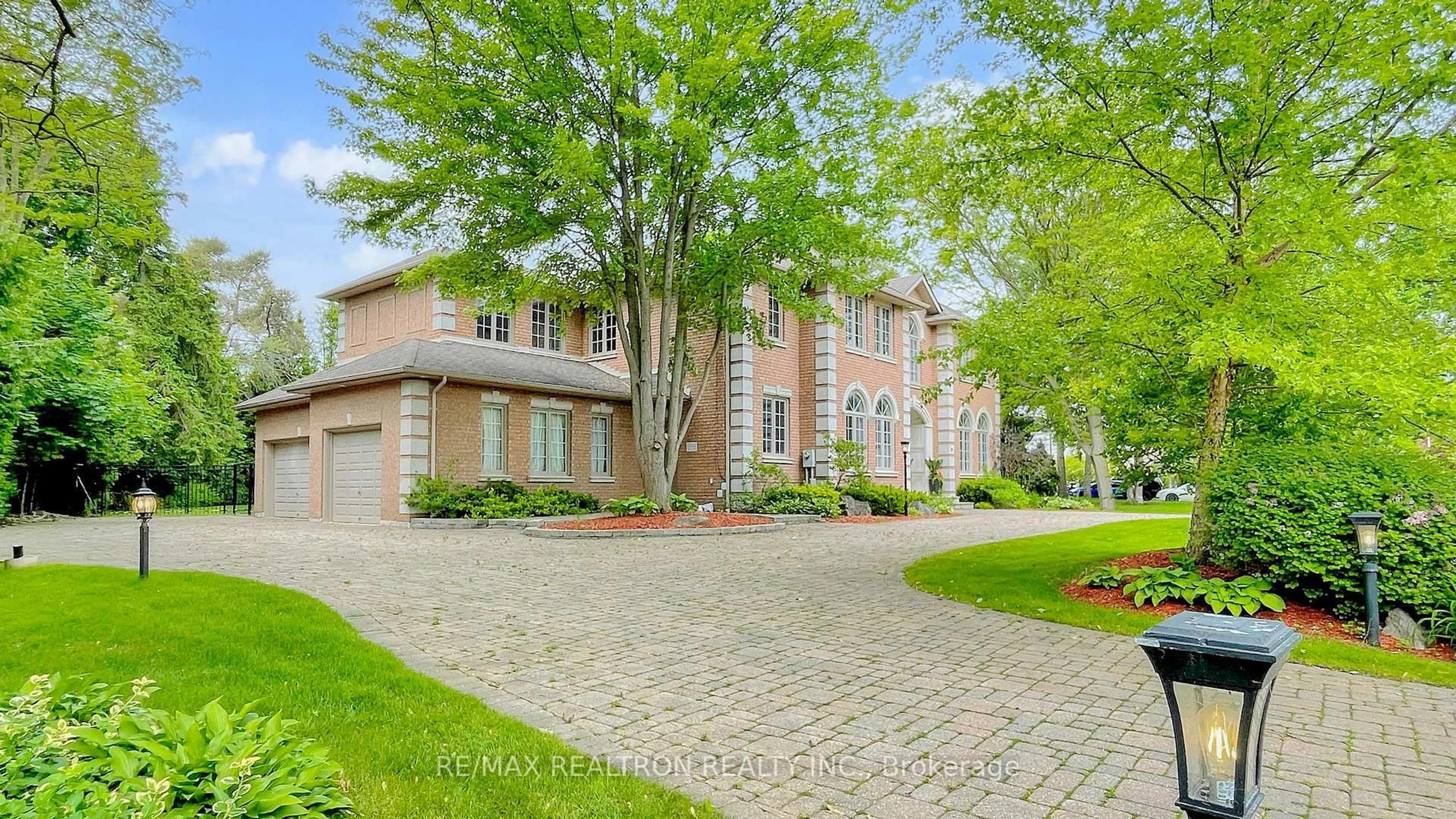 Home with brick exterior material, street for 22 Valloncliffe Rd, Markham Ontario L3T 2W8