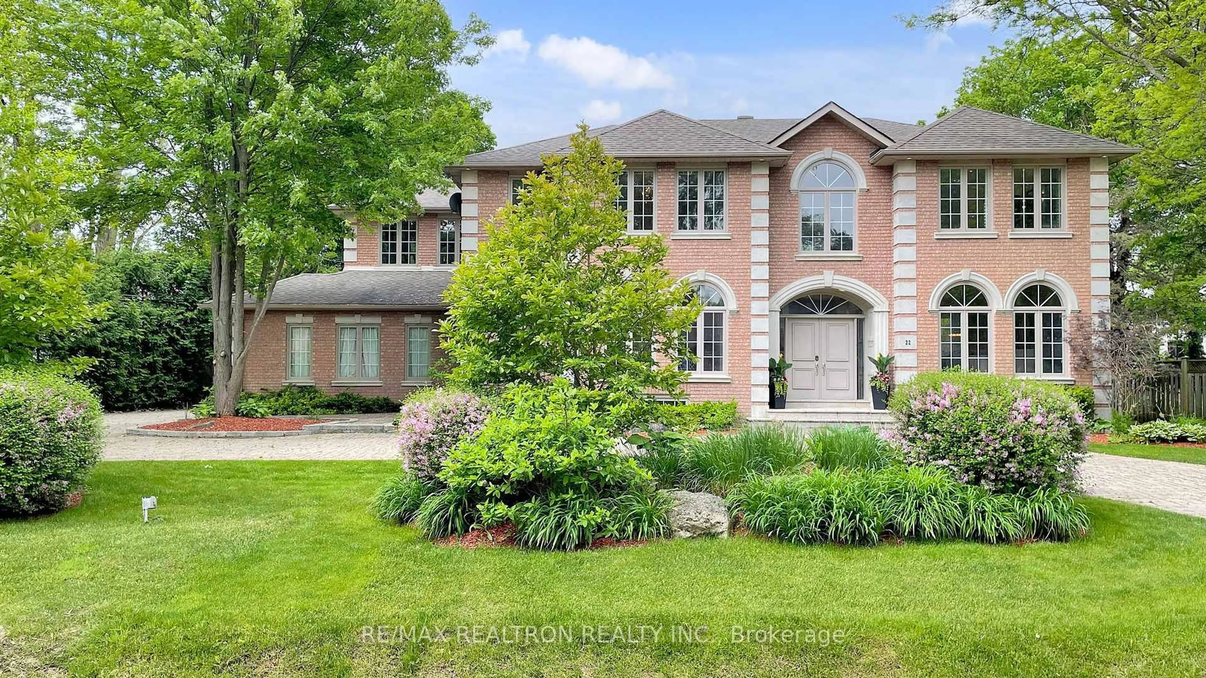 Home with brick exterior material, street for 22 Valloncliffe Rd, Markham Ontario L3T 2W8