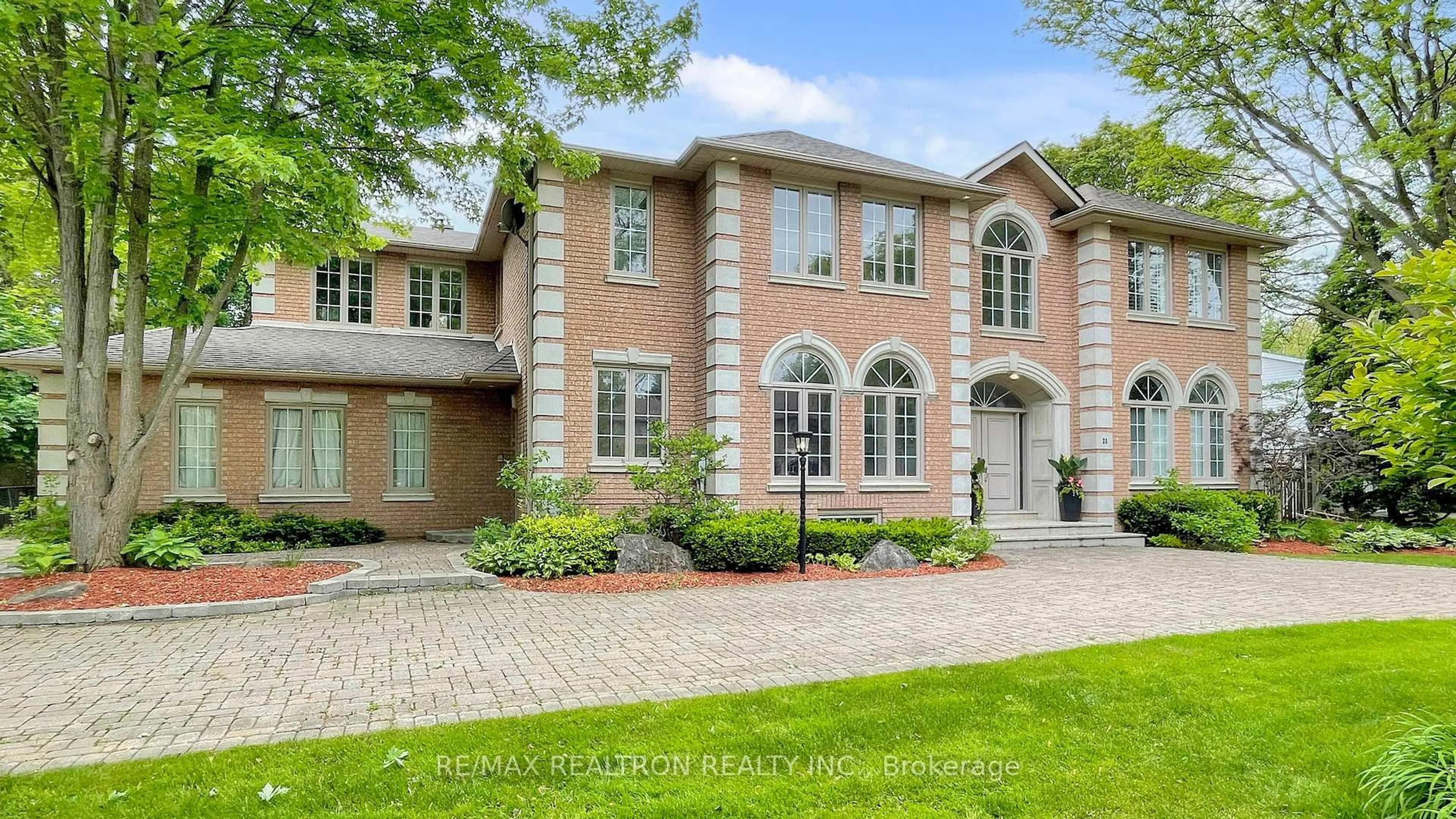 Home with brick exterior material, street for 22 Valloncliffe Rd, Markham Ontario L3T 2W8