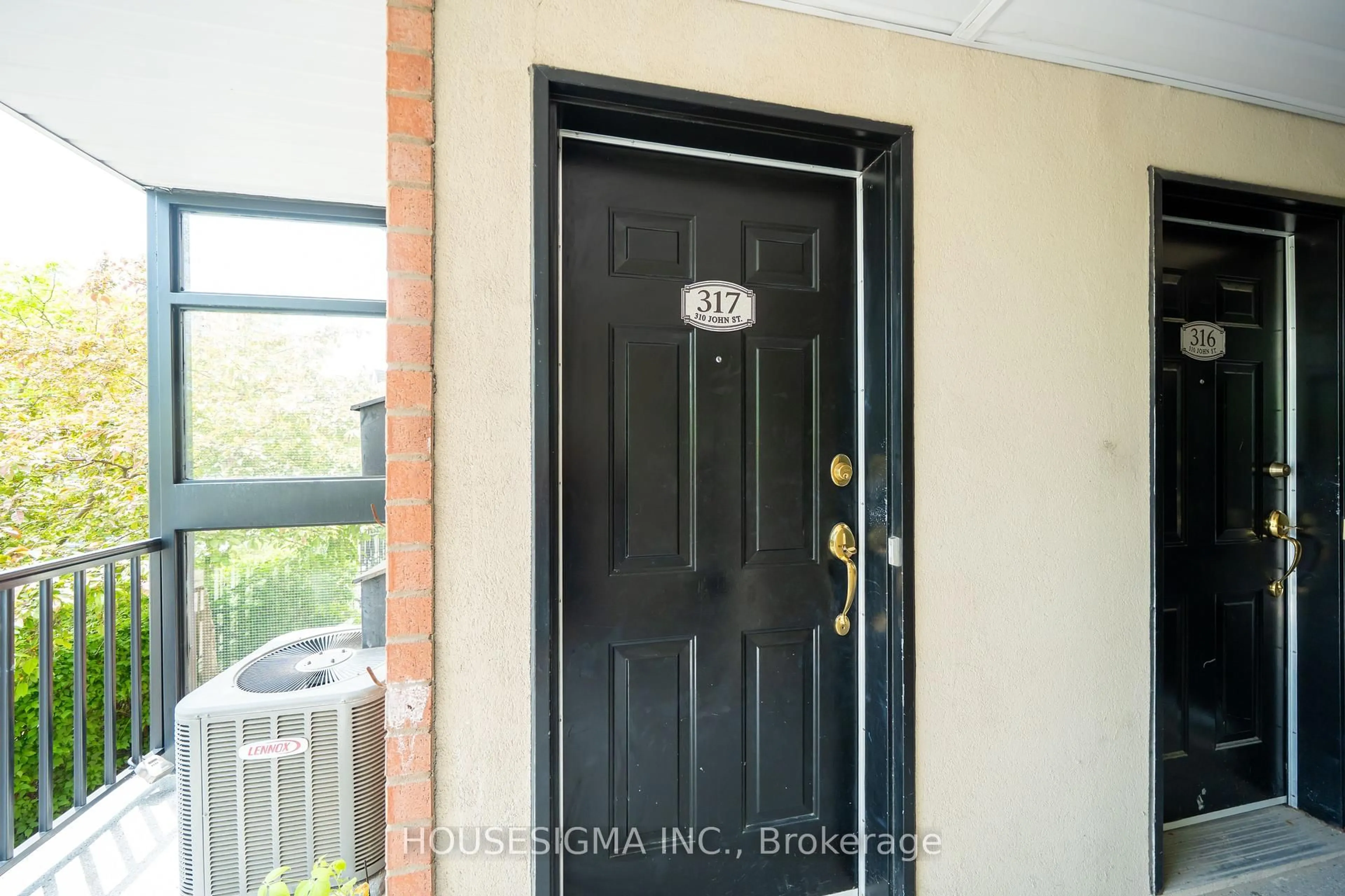 Indoor entryway for 310 John St #317, Markham Ontario L3T 0A7