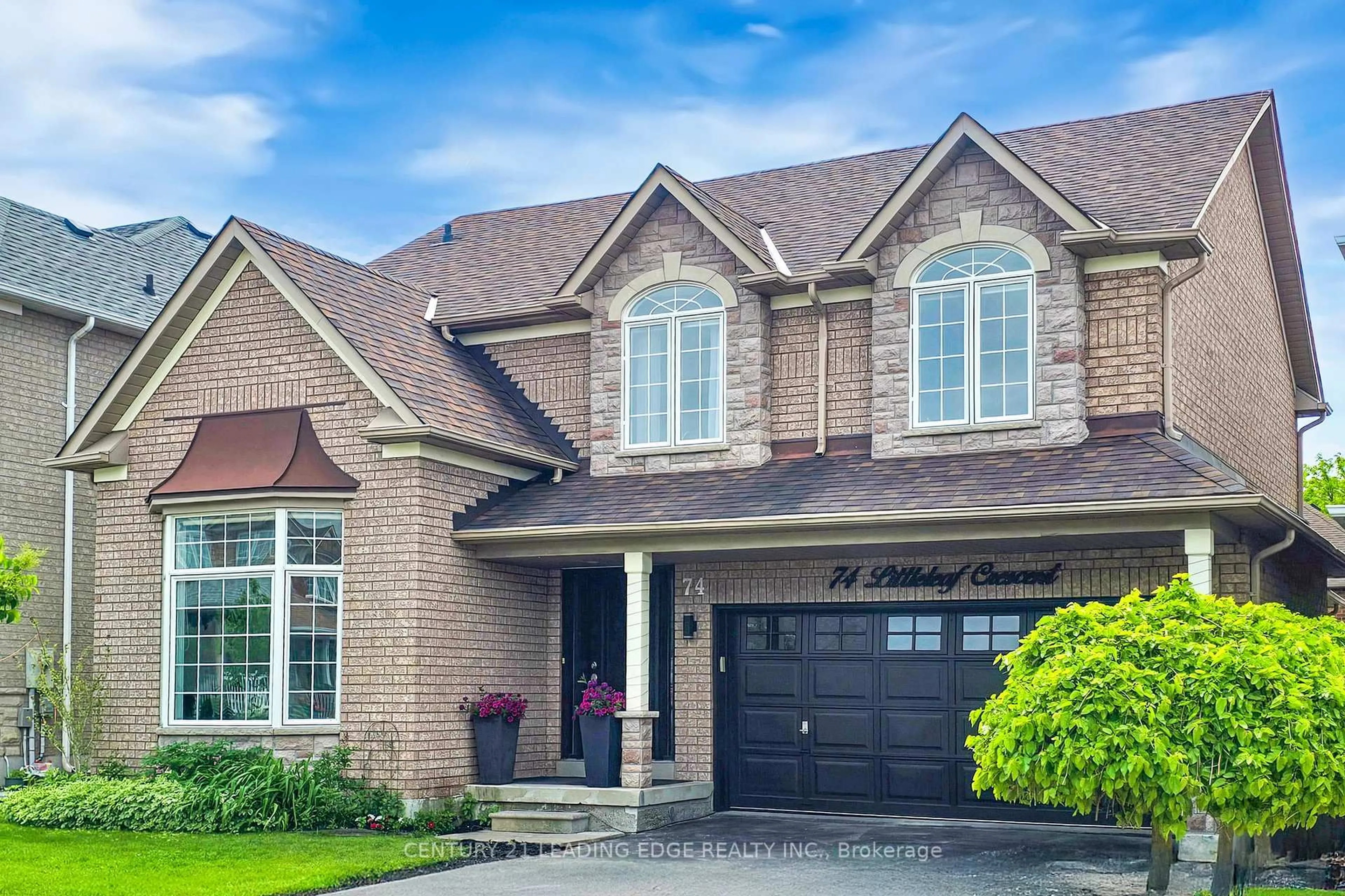 Home with brick exterior material, street for 74 Littleleaf Cres, Markham Ontario L3S 4G1