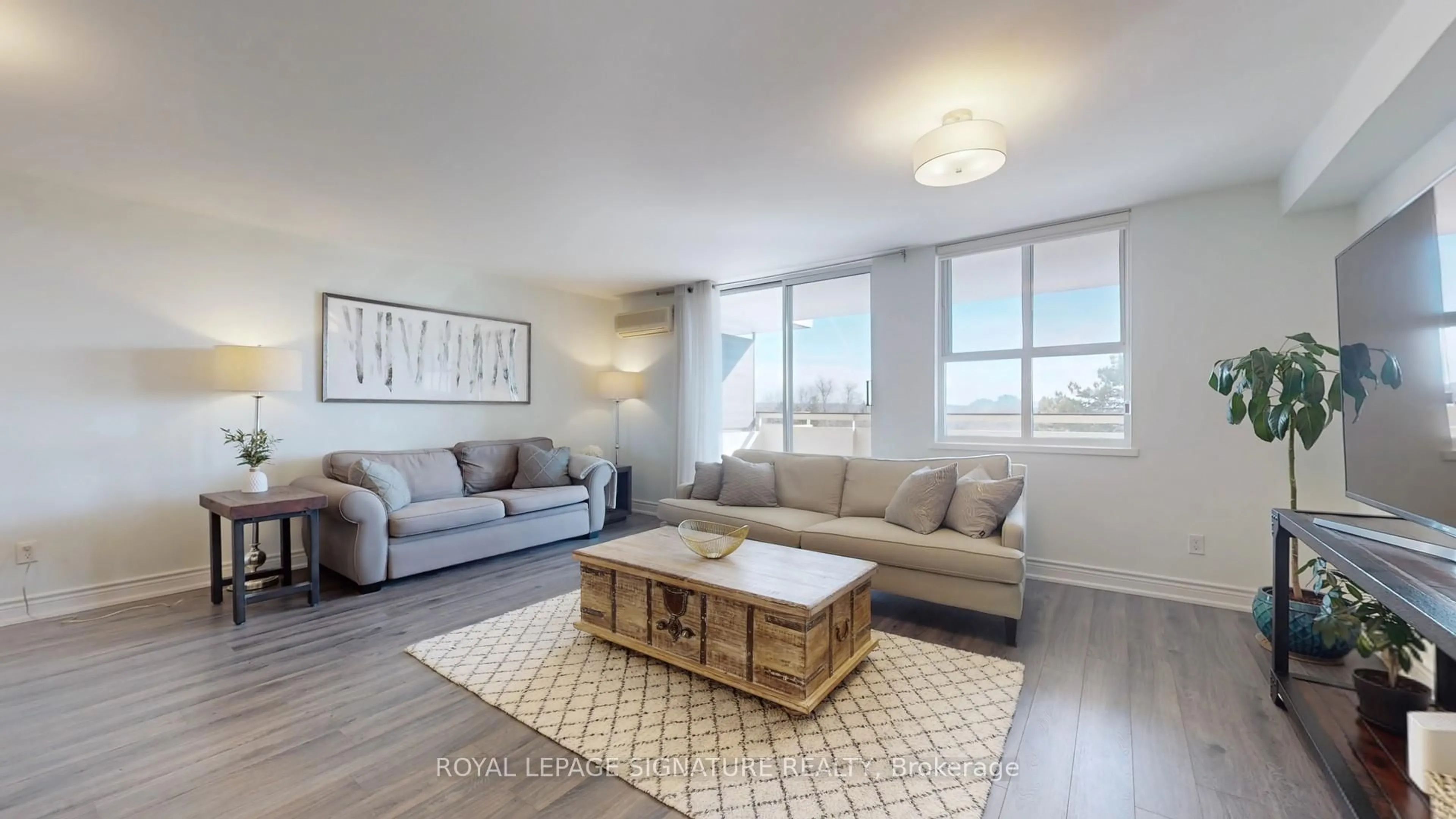 Living room with furniture, wood/laminate floor for 80 Inverlochy Blvd #508, Markham Ontario L3T 4P3
