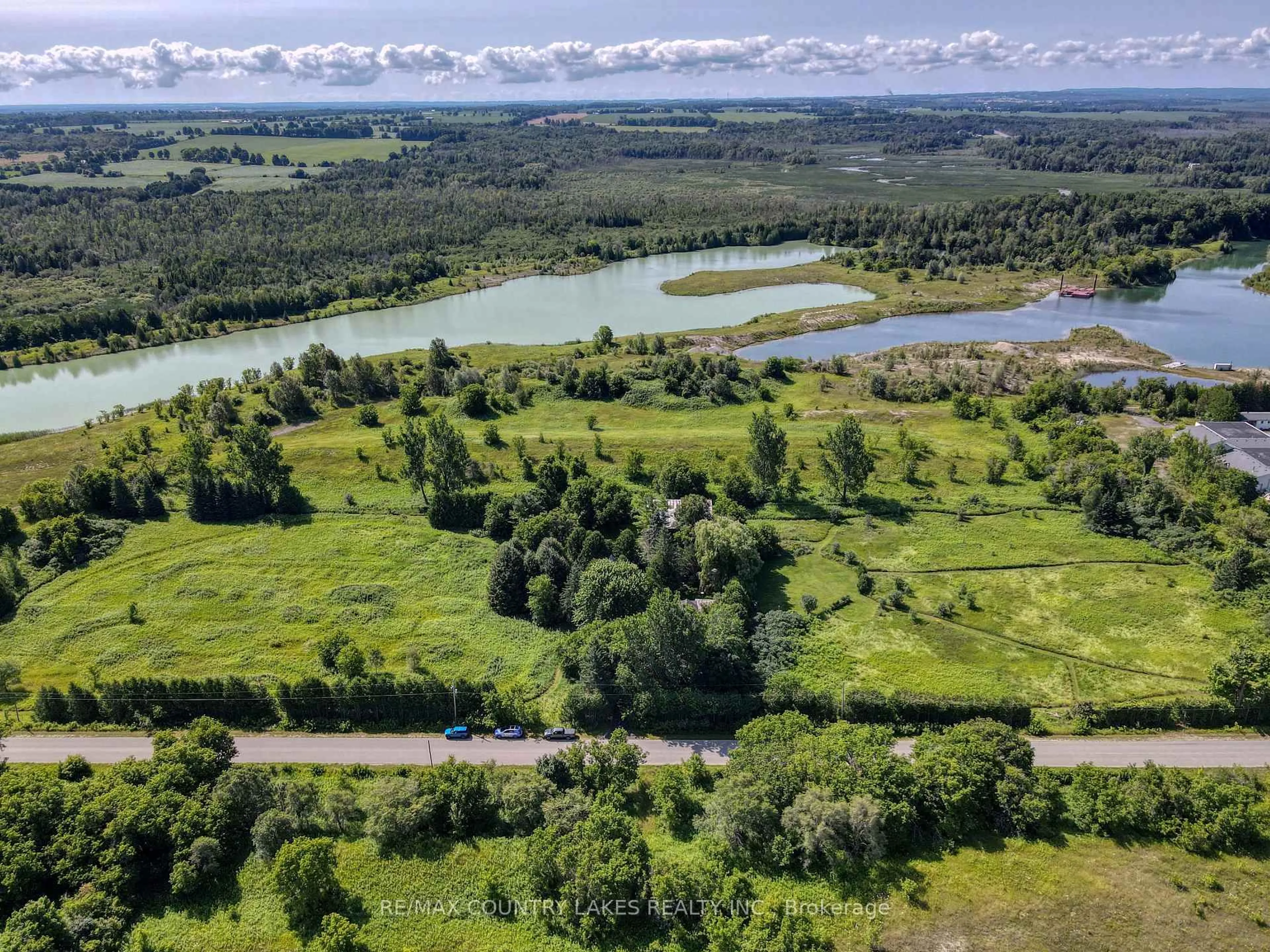 A pic from outside/outdoor area/front of a property/back of a property/a pic from drone, water/lake/river/ocean view for 1330 Concession 5 Rd, Brock Ontario L0C 1H0