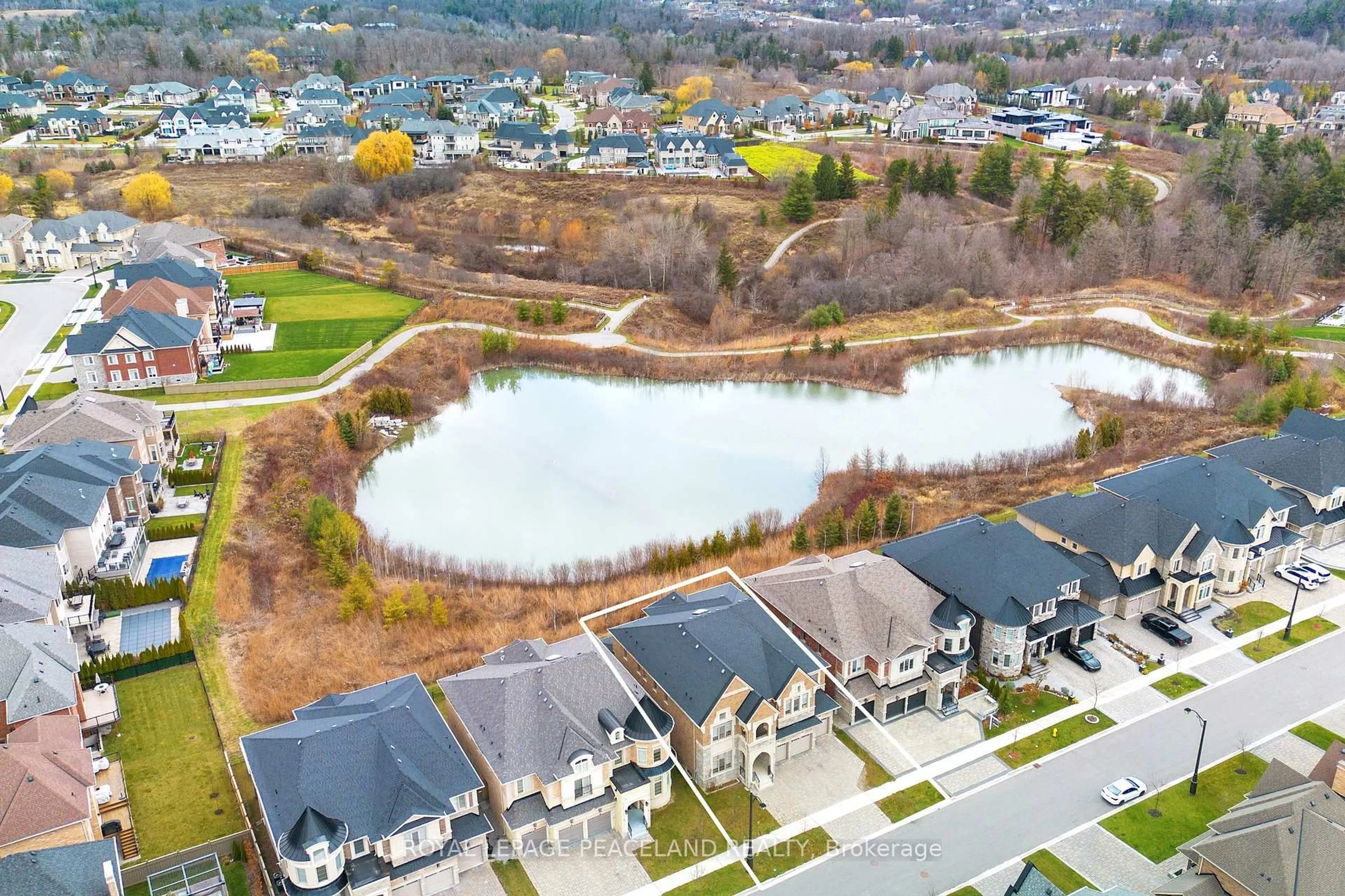 A pic from outside/outdoor area/front of a property/back of a property/a pic from drone, water/lake/river/ocean view for 20 Rolling Green Crt, Vaughan Ontario L4H 4K7