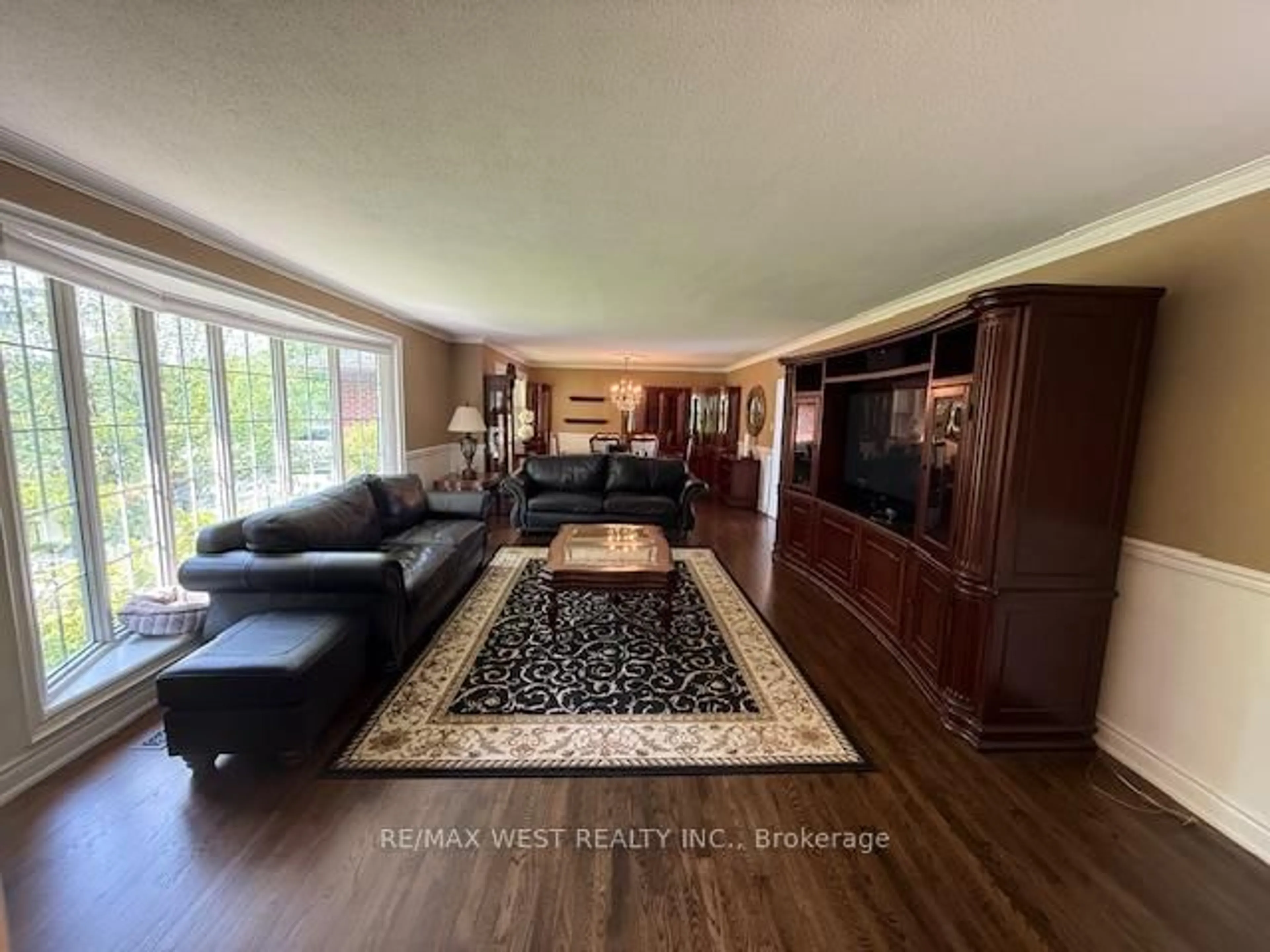 Living room with furniture, wood/laminate floor for 6600 King Vaughan Rd, Vaughan Ontario L0J 1C0