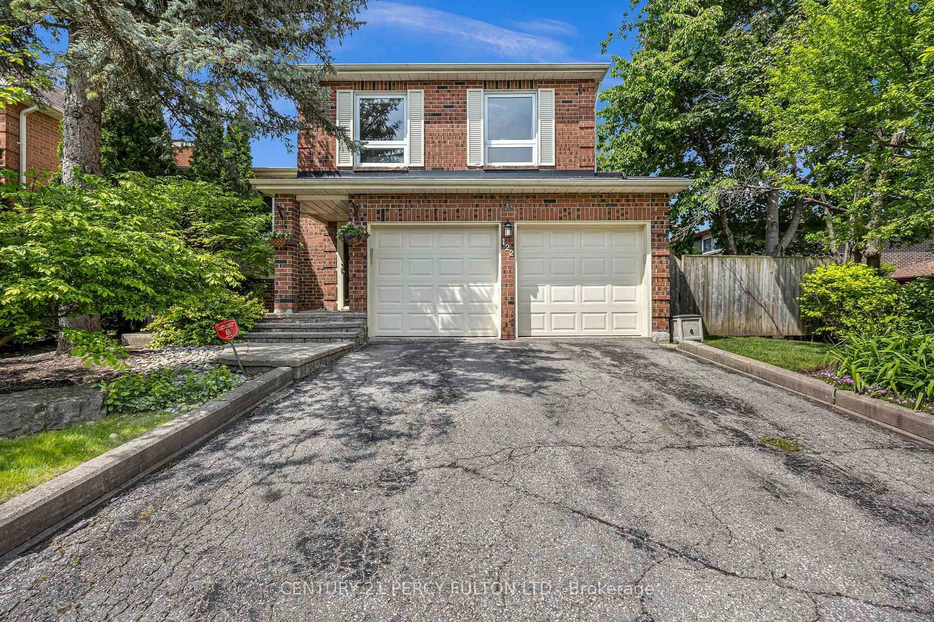 Home with brick exterior material, street for 122 Wootten Way, Markham Ontario L3P 4C6