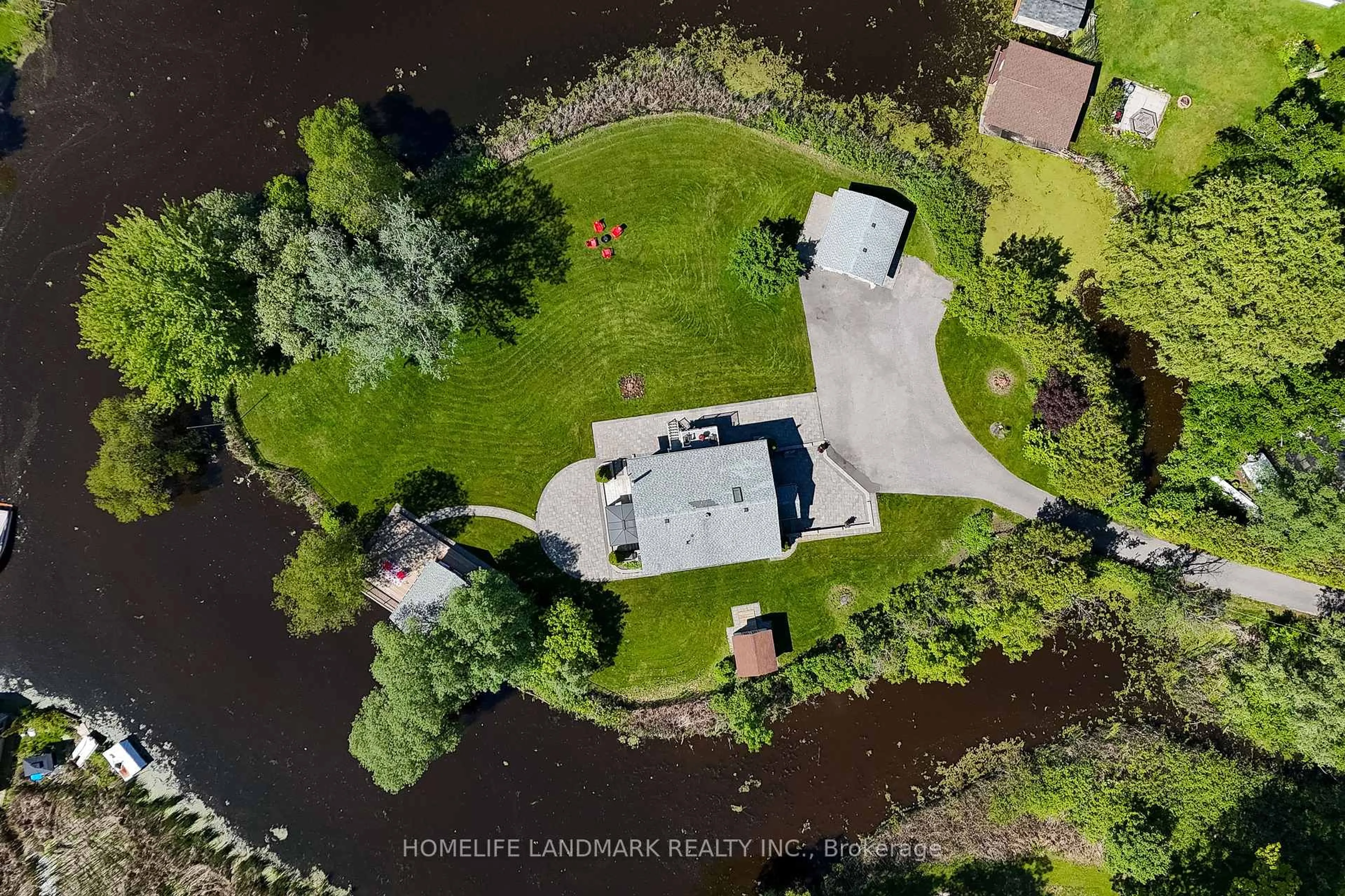 A pic from outside/outdoor area/front of a property/back of a property/a pic from drone, water/lake/river/ocean view for 57 Riveredge Dr, Georgina Ontario L4P 2N8