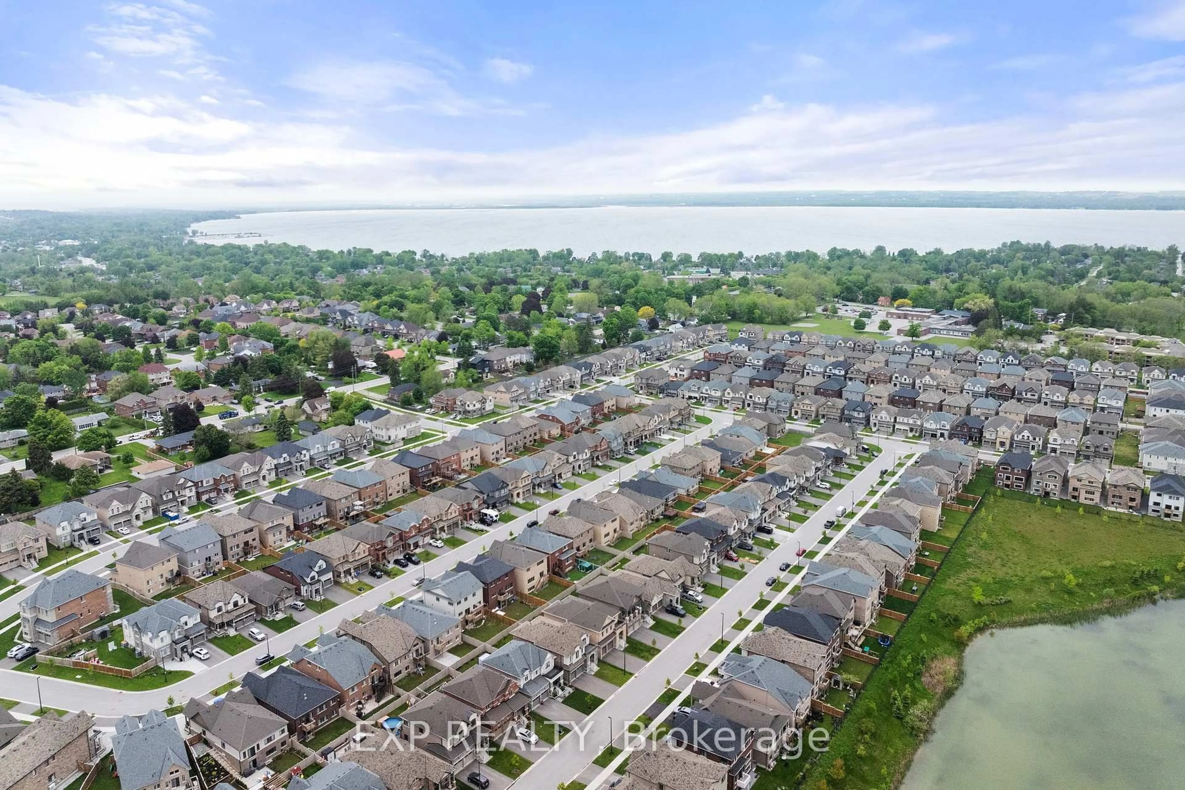 A pic from outside/outdoor area/front of a property/back of a property/a pic from drone, water/lake/river/ocean view for 26 Pietrowski Dr, Georgina Ontario L4P 1J5