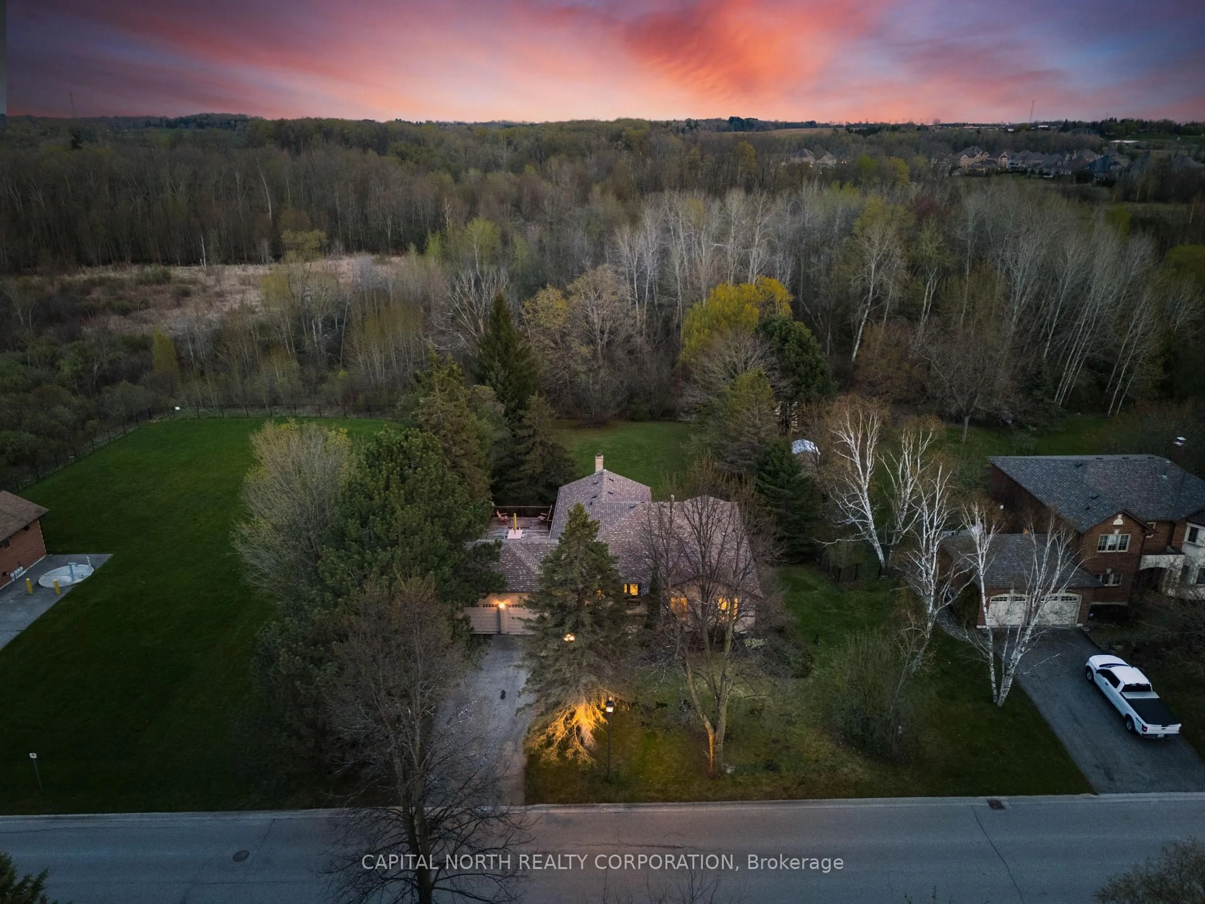 A pic from outside/outdoor area/front of a property/back of a property/a pic from drone, water/lake/river/ocean view for 47 Burton Grve, King Ontario L7B 1C6