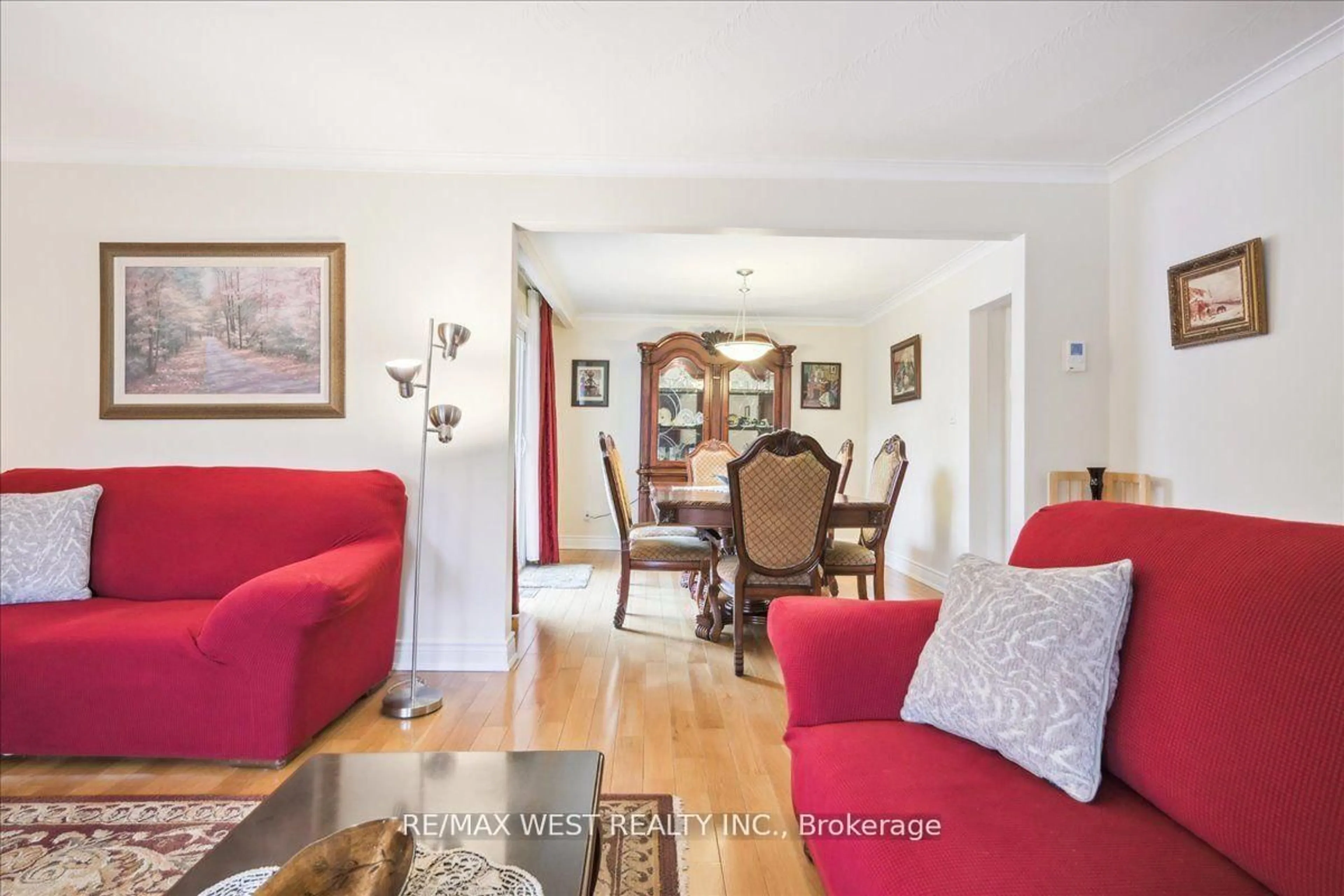 Living room with furniture, wood/laminate floor for 117 Willis Rd, Vaughan Ontario L4L 2S4
