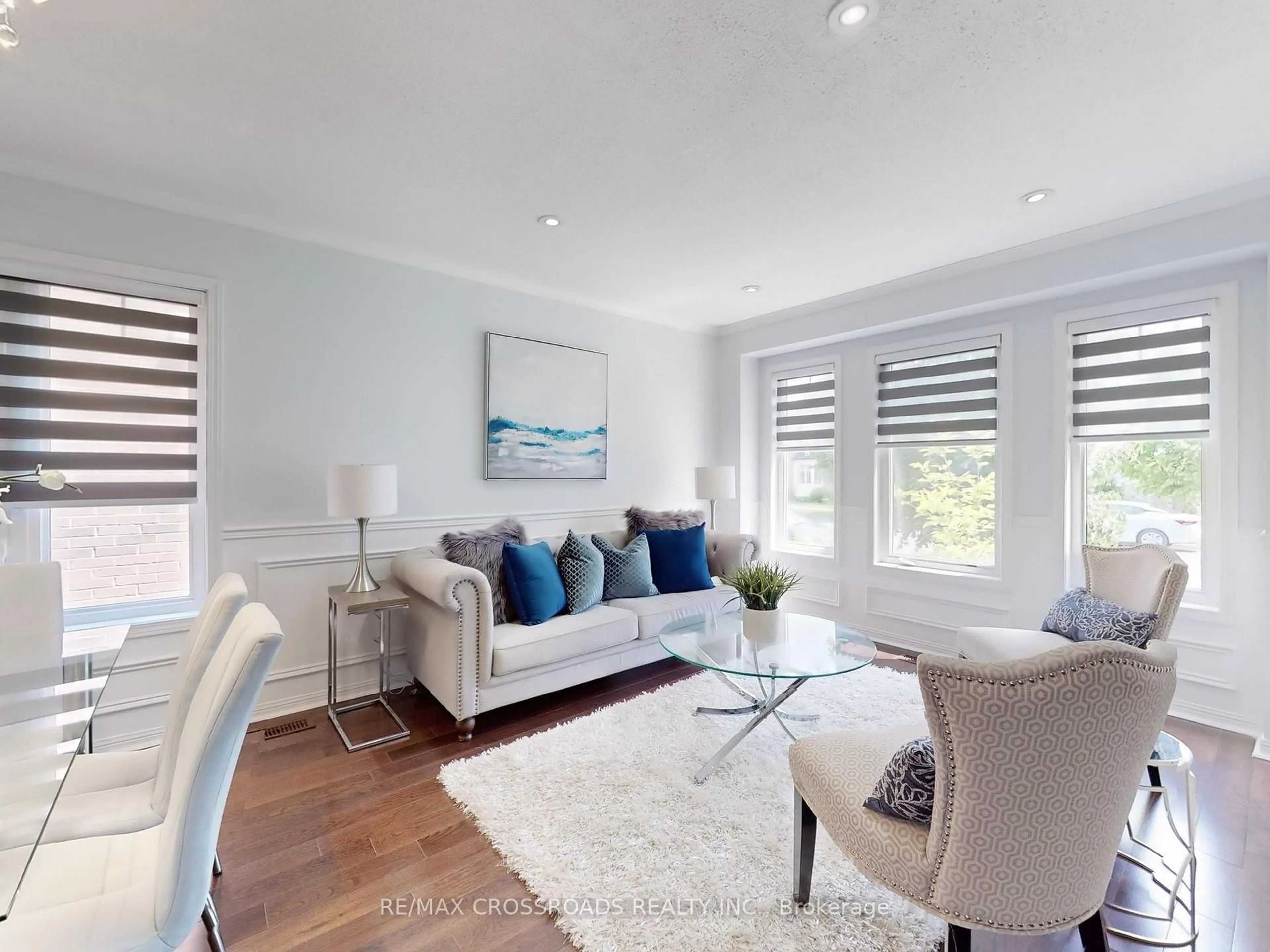 Living room with furniture, wood/laminate floor for 244 White's Hill Ave, Markham Ontario L6B 1K1