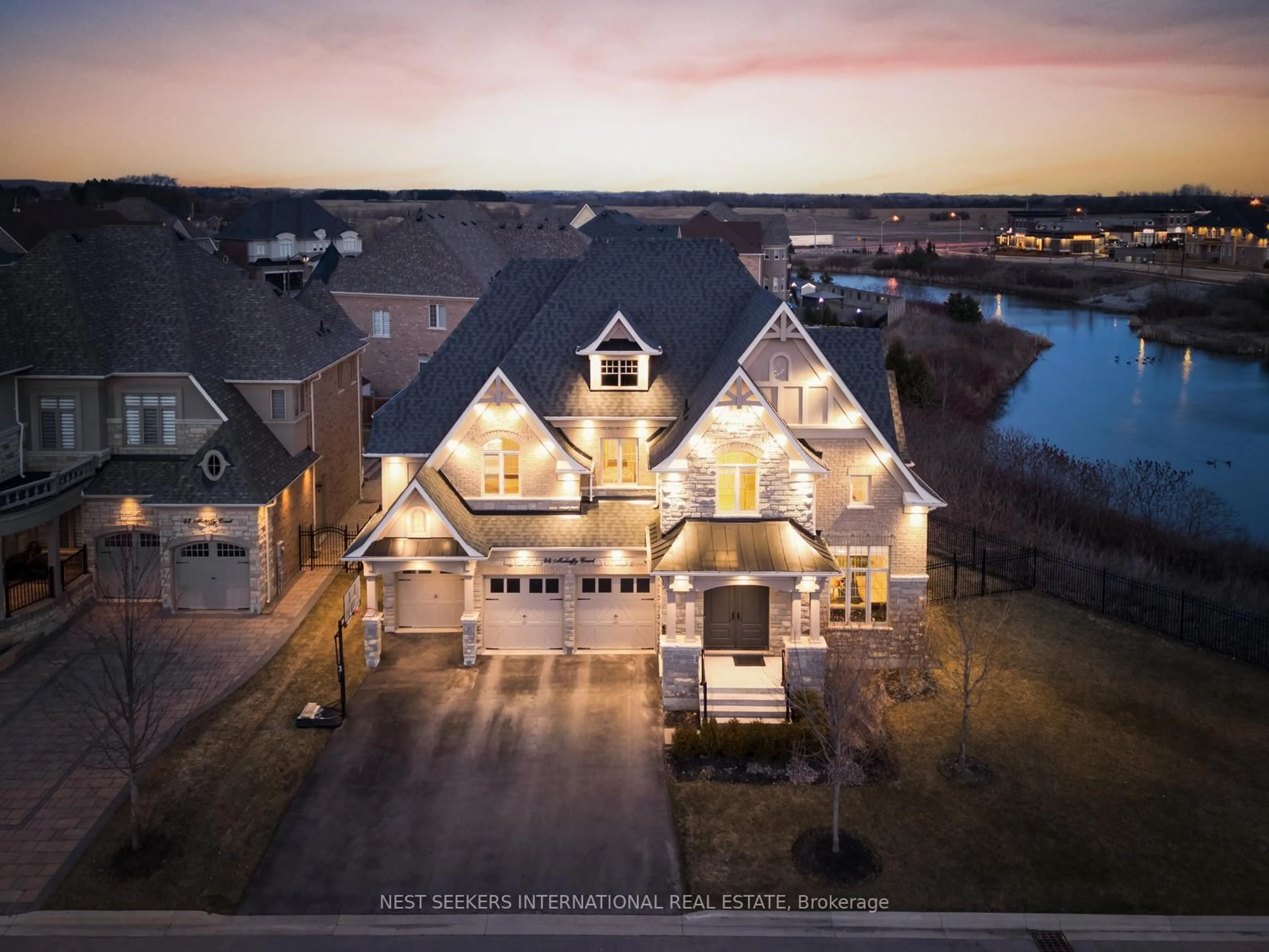 A pic from outside/outdoor area/front of a property/back of a property/a pic from drone, water/lake/river/ocean view for 44 Mahaffy Crt, King Ontario L7B 0N8