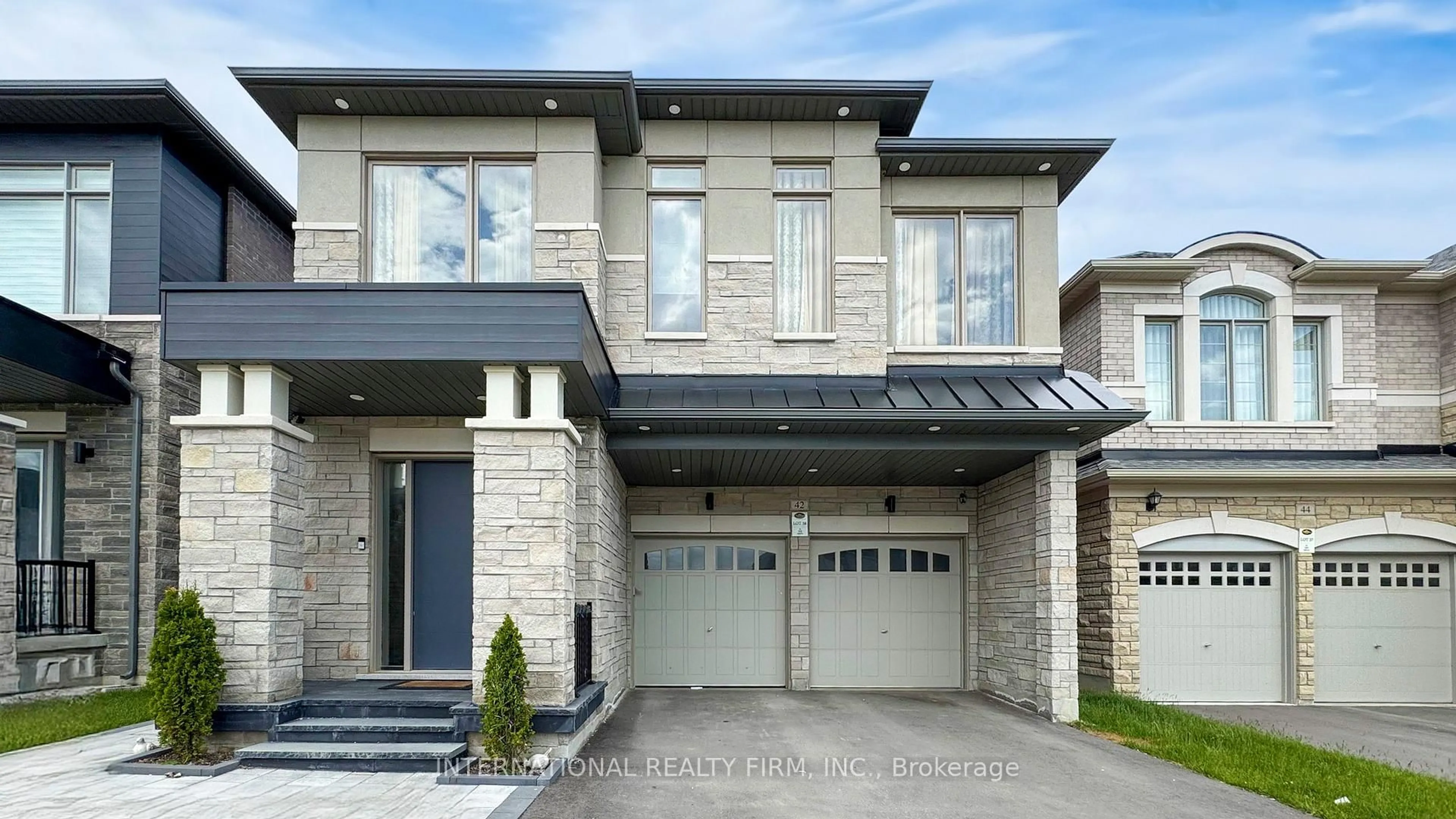 Home with brick exterior material, street for 42 Tipp Dr, Richmond Hill Ontario L4E 1A2