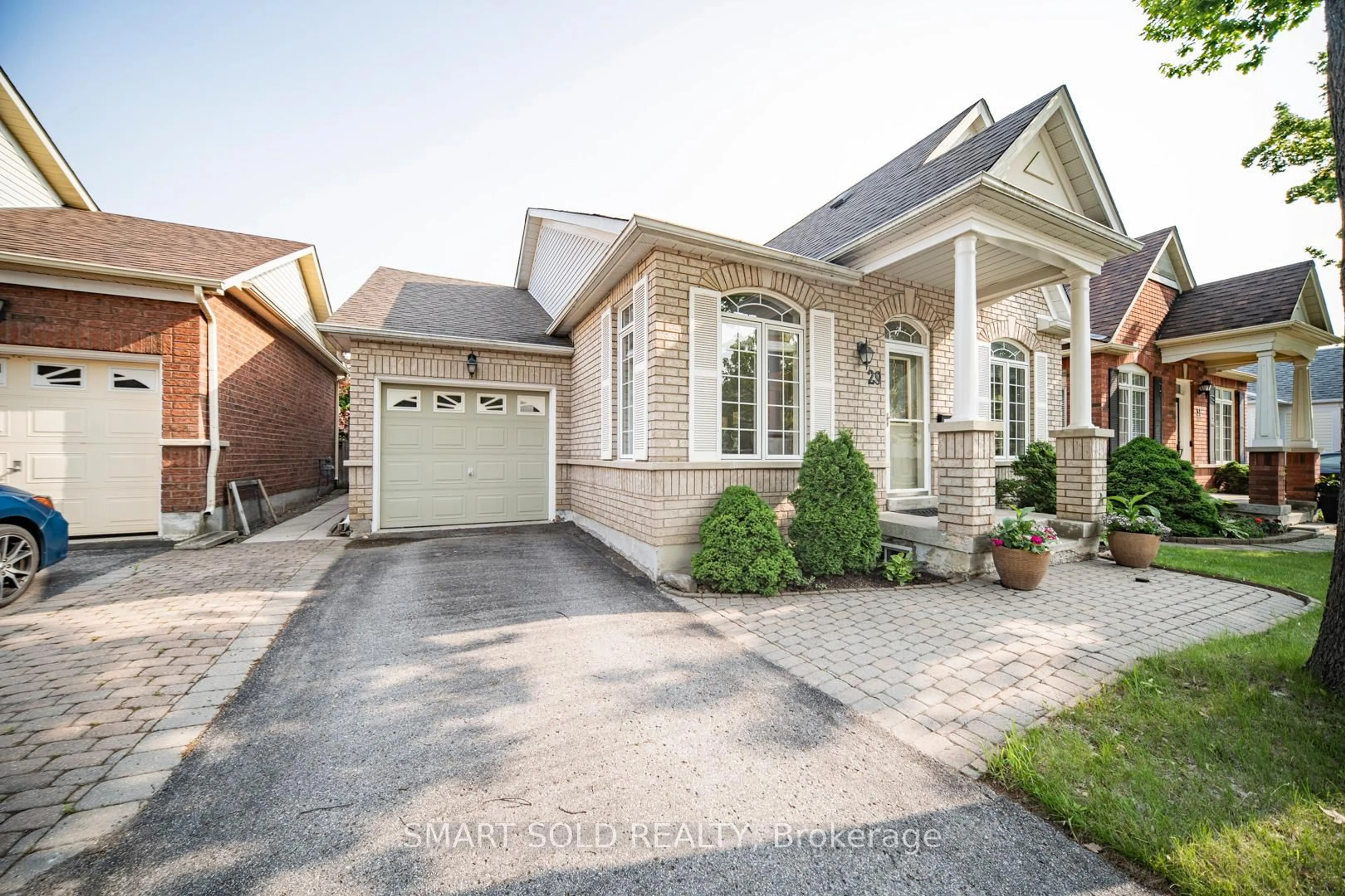 Home with brick exterior material, street for 29 Cliveden Pl, Markham Ontario L6C 2S4