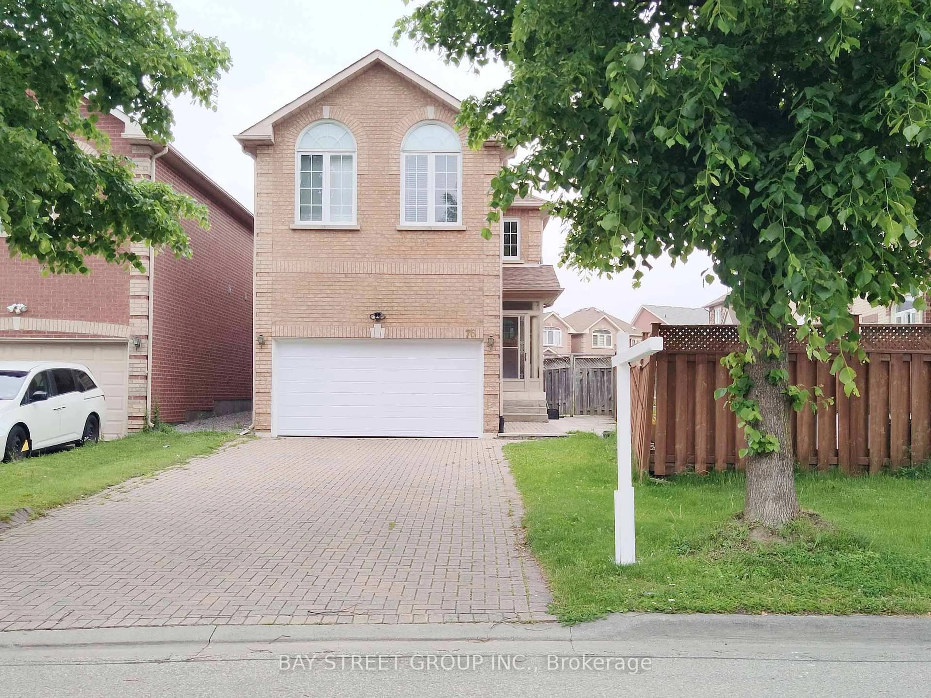Home with brick exterior material, street for 76 Greensboro Dr, Markham Ontario L3R 0V5