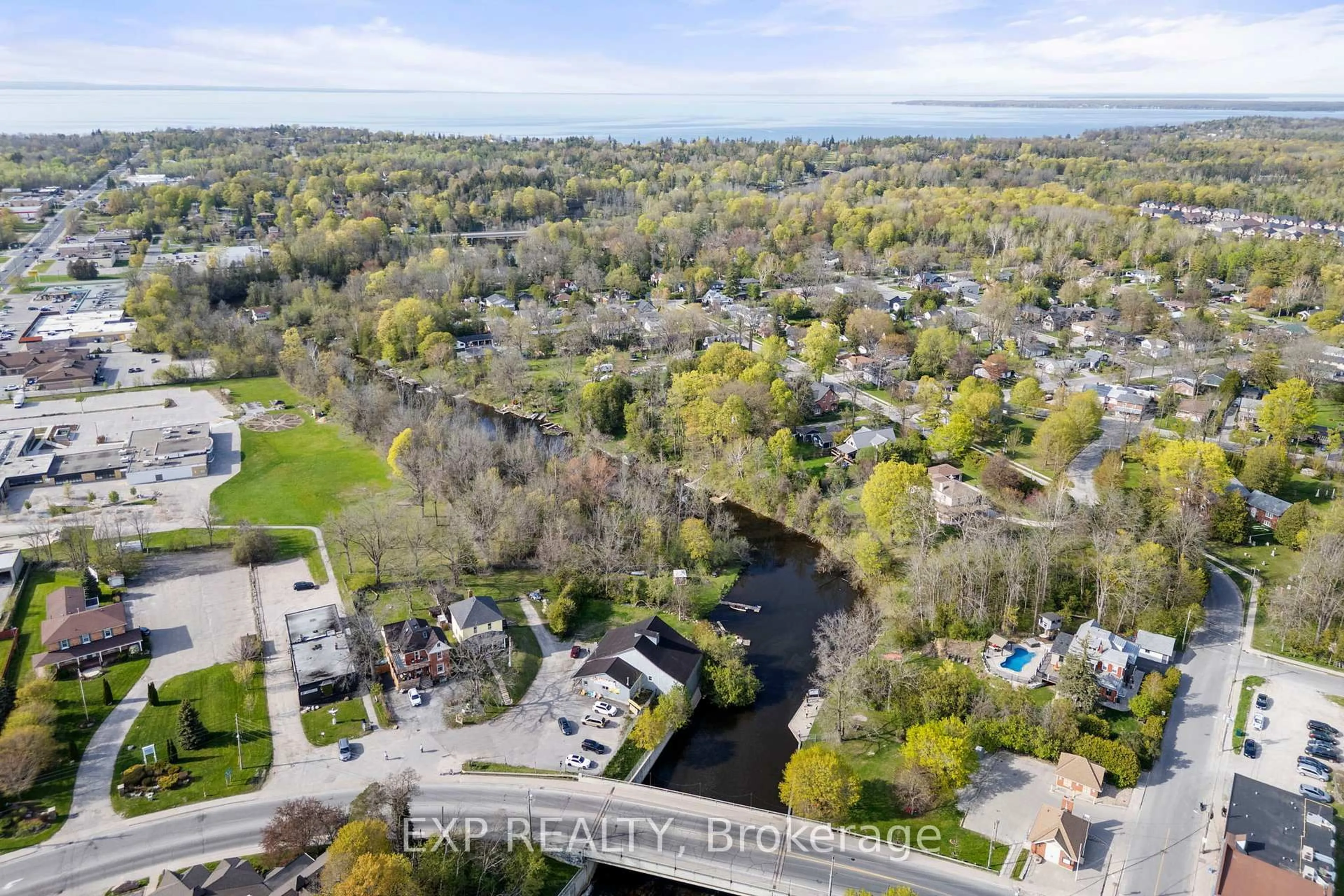 A pic from outside/outdoor area/front of a property/back of a property/a pic from drone, water/lake/river/ocean view for 145 High St, Georgina Ontario L0E 1R0