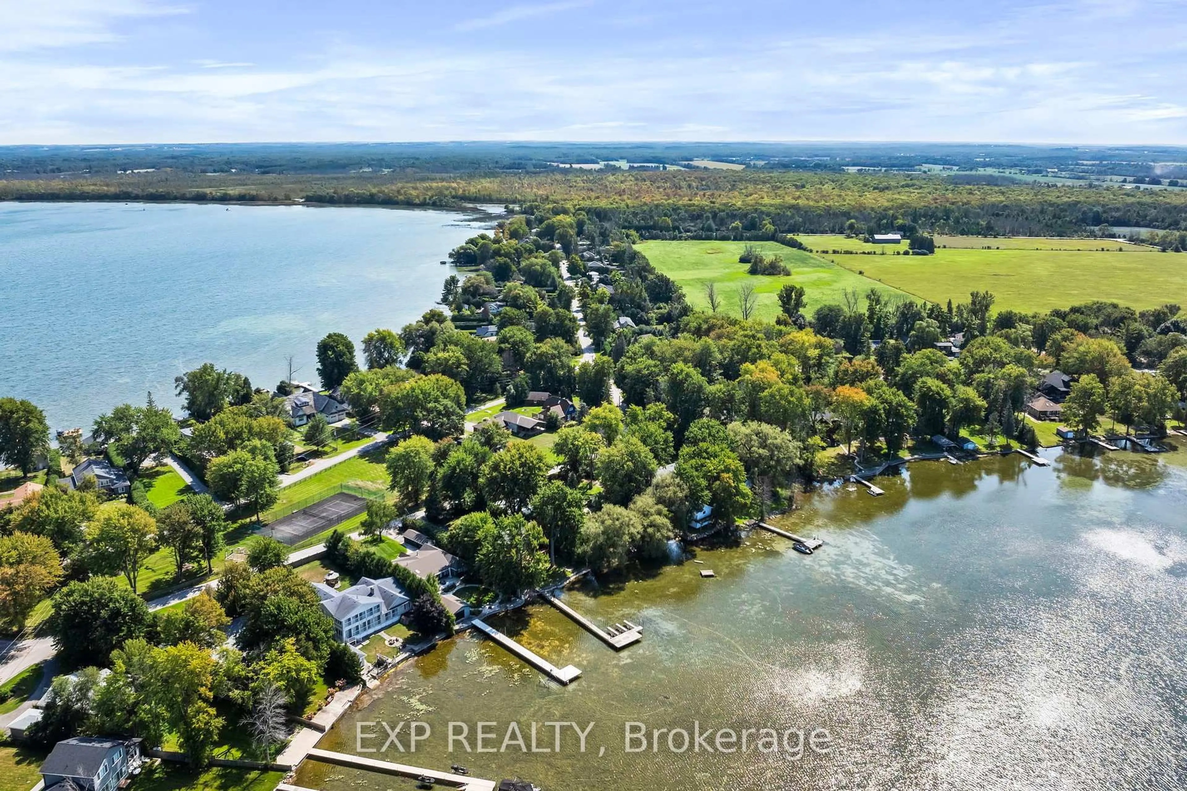 A pic from outside/outdoor area/front of a property/back of a property/a pic from drone, water/lake/river/ocean view for 582 Duclos Point Rd, Georgina Ontario L0E 1N0