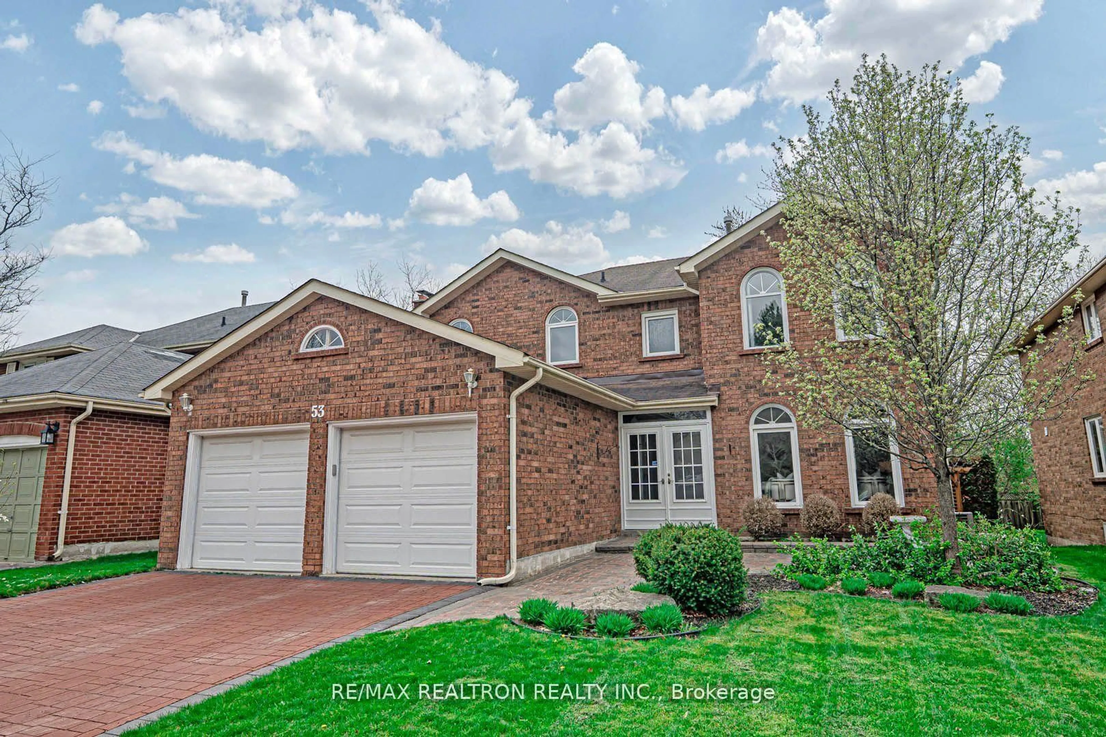 Home with brick exterior material, street for 53 Leighland Dr, Markham Ontario L3R 7R8