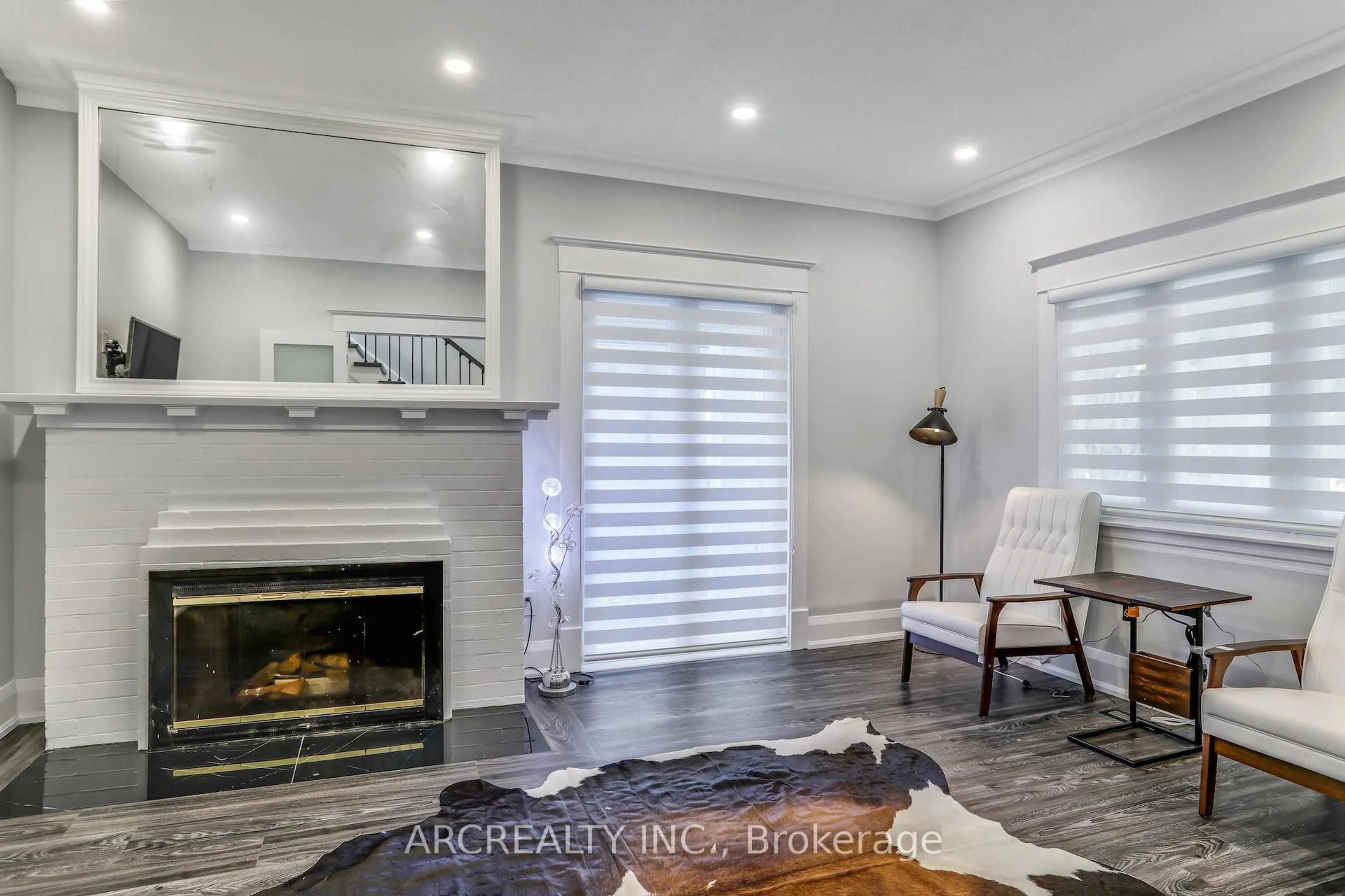 Living room with furniture, wood/laminate floor for 97 Centre St, Richmond Hill Ontario L4C 1A3