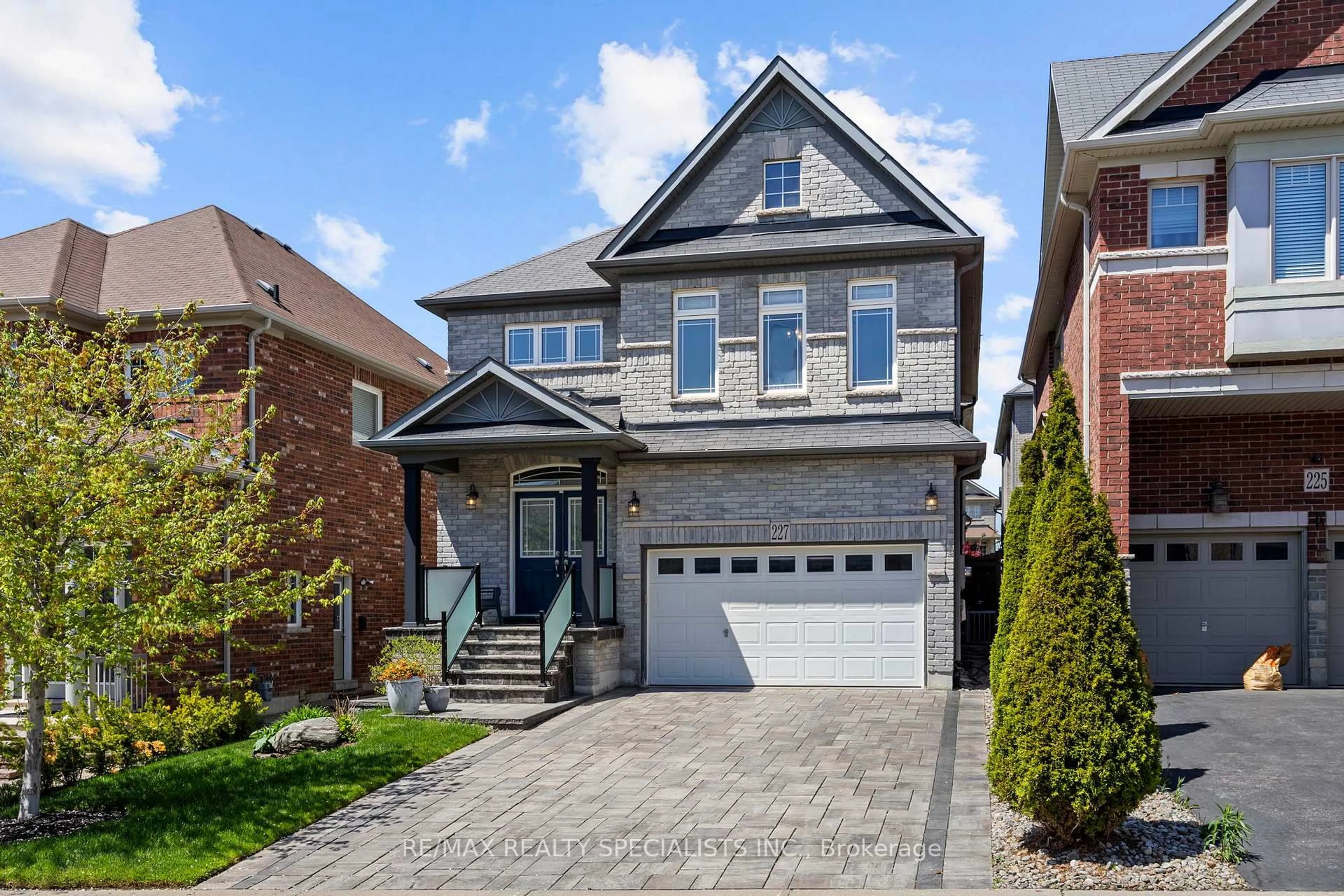 Home with brick exterior material, street for 227 Aspenwood Dr, Newmarket Ontario L3K 3K7