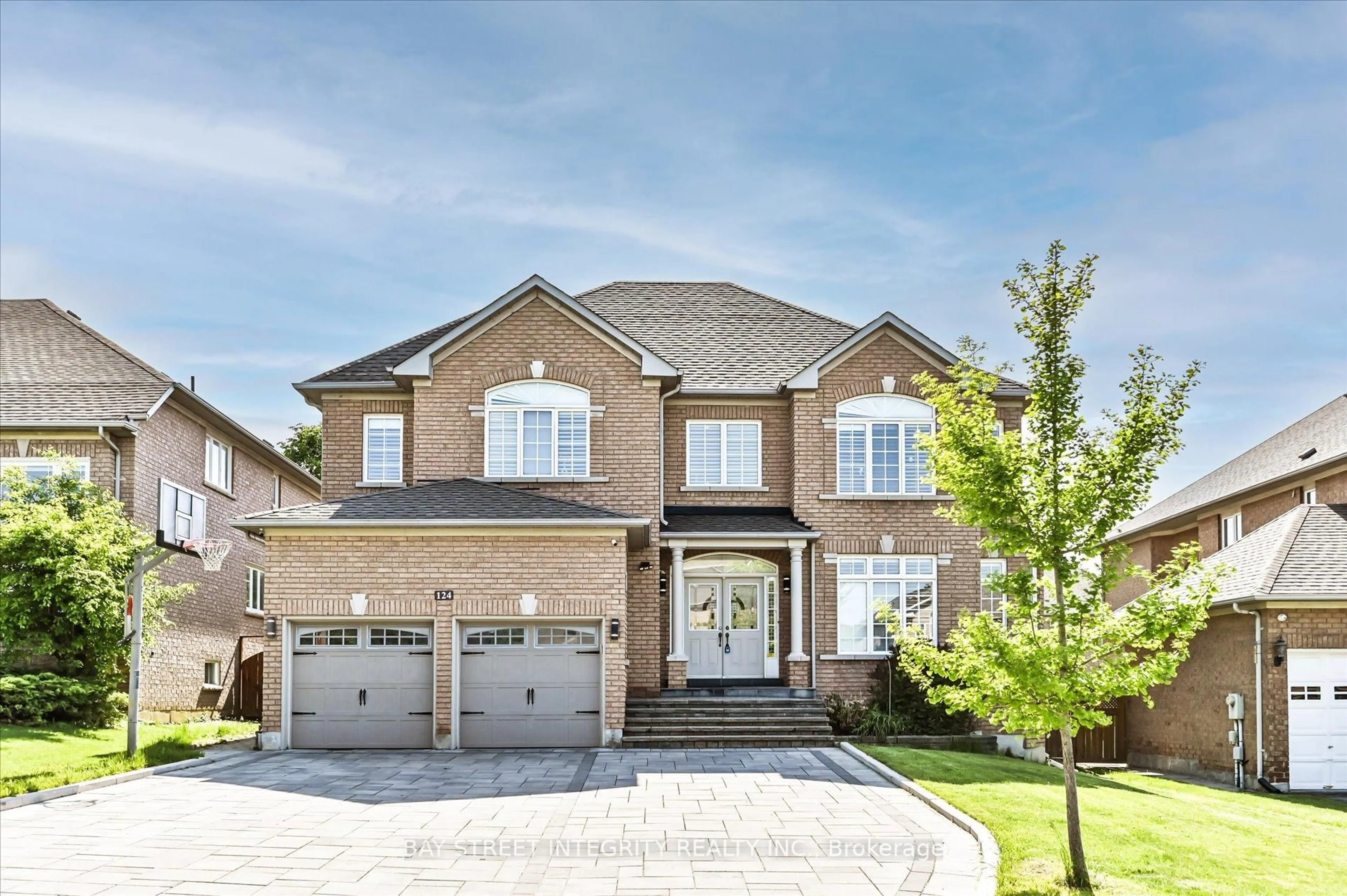 Home with brick exterior material, street for 124 Spring Blossom Cres, Markham Ontario L6C 1X4