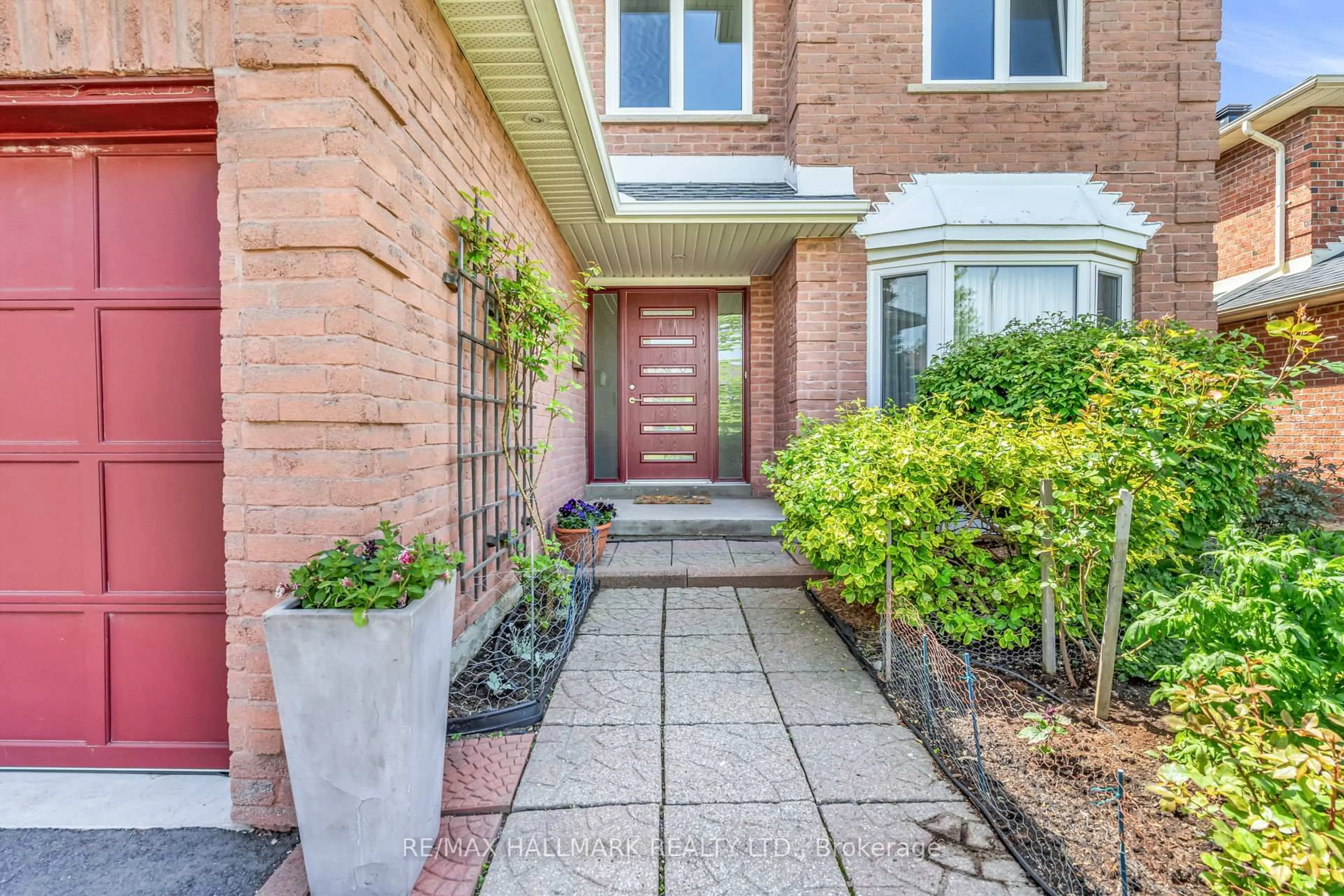 Home with brick exterior material, street for 54 Bryant Rd, Markham Ontario L3P 5Z2