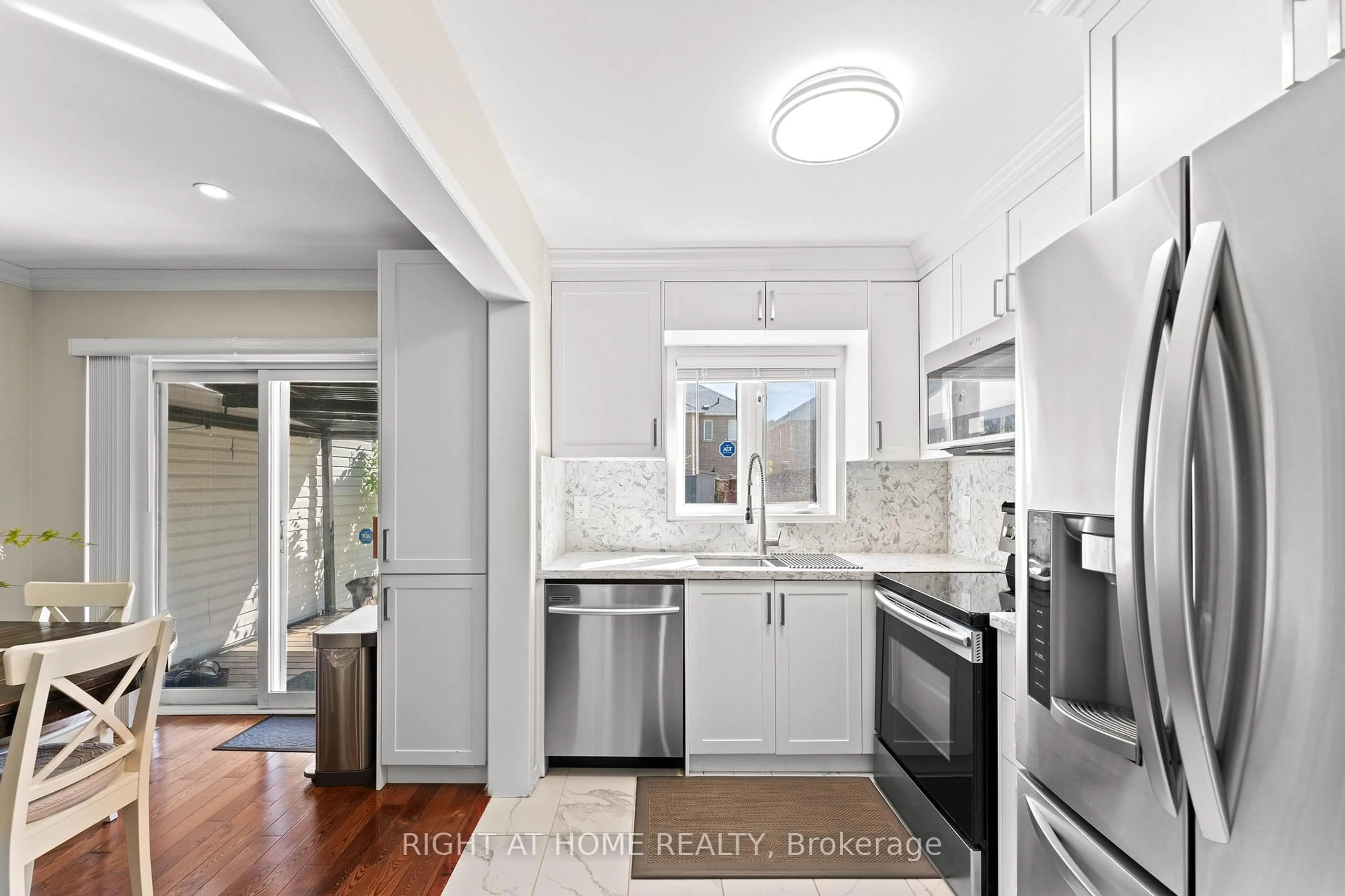 Open concept kitchen, ceramic/tile floor for 115 Ferncliffe Cres, Markham Ontario L3S 4N7