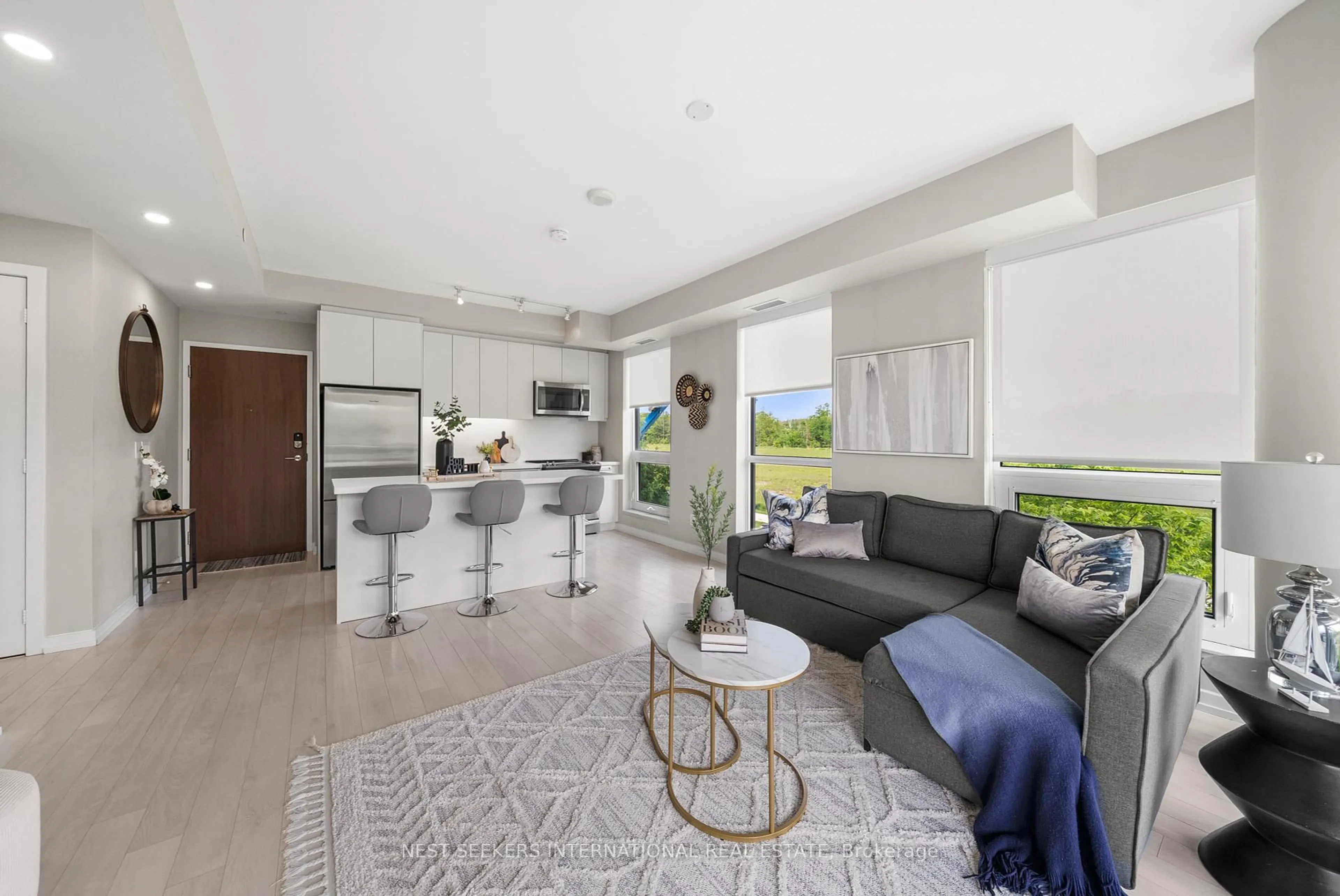 Open concept kitchen, ceramic/tile floor for 241 Sea Ray Ave #A213, Innisfil Ontario L9S 2P7